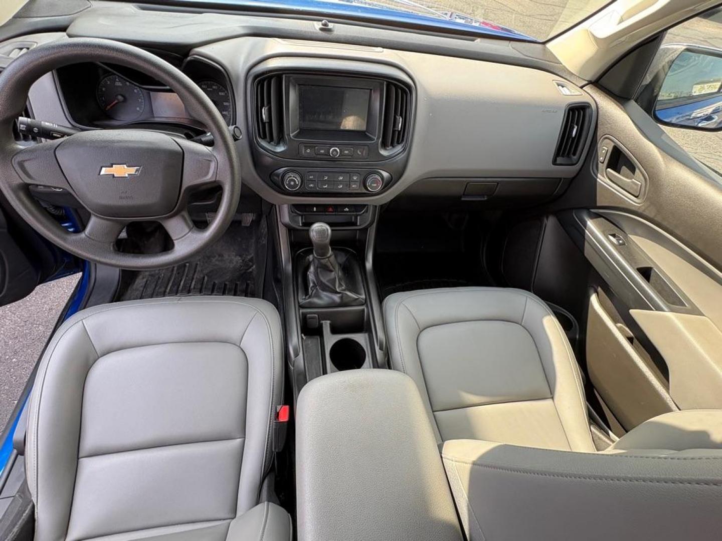 2018 BLUE CHEVROLET COLORADO (1GCHSAEAXJ1) with an 2.5L engine, 6-Speed Manual transmission, located at 501 E. Columbia St., Springfield, OH, 45503, (800) 262-7122, 39.925262, -83.801796 - *** Price Includes Documentation Fee! *** LOW MILES ***** Back Up Camera *** 6 Speed Manual **** Nice!!! *** Oil and filter change **** New Cabin and Air filter *** Jay North Auto has offered hand picked vehicles since 1965! Our customer's enjoy a NO pressure buying experience with a small town - Photo#12