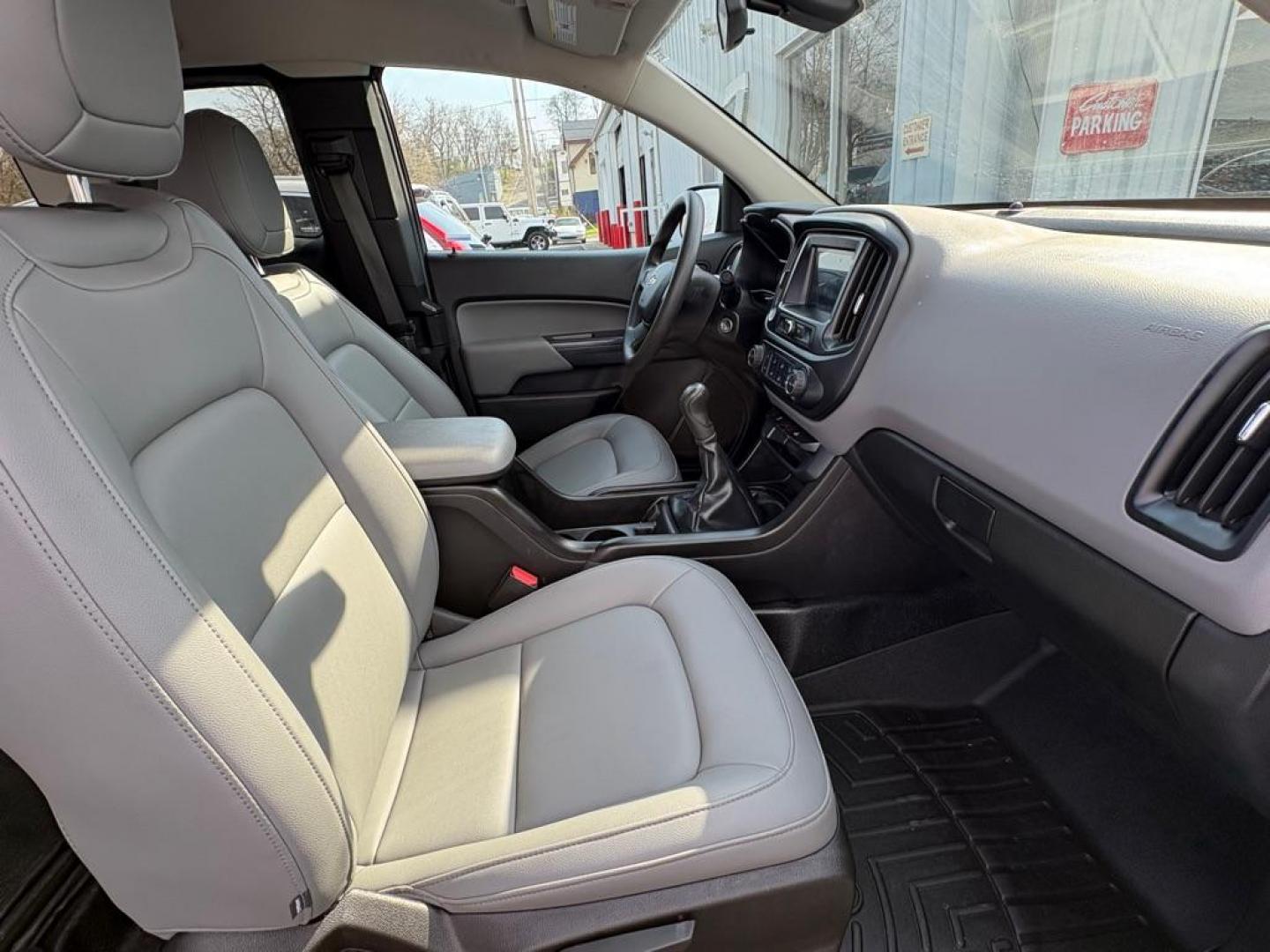 2018 BLUE CHEVROLET COLORADO (1GCHSAEAXJ1) with an 2.5L engine, 6-Speed Manual transmission, located at 501 E. Columbia St., Springfield, OH, 45503, (800) 262-7122, 39.925262, -83.801796 - *** Price Includes Documentation Fee! *** LOW MILES ***** Back Up Camera *** 6 Speed Manual **** Nice!!! *** Oil and filter change **** New Cabin and Air filter *** Jay North Auto has offered hand picked vehicles since 1965! Our customer's enjoy a NO pressure buying experience with a small town - Photo#16