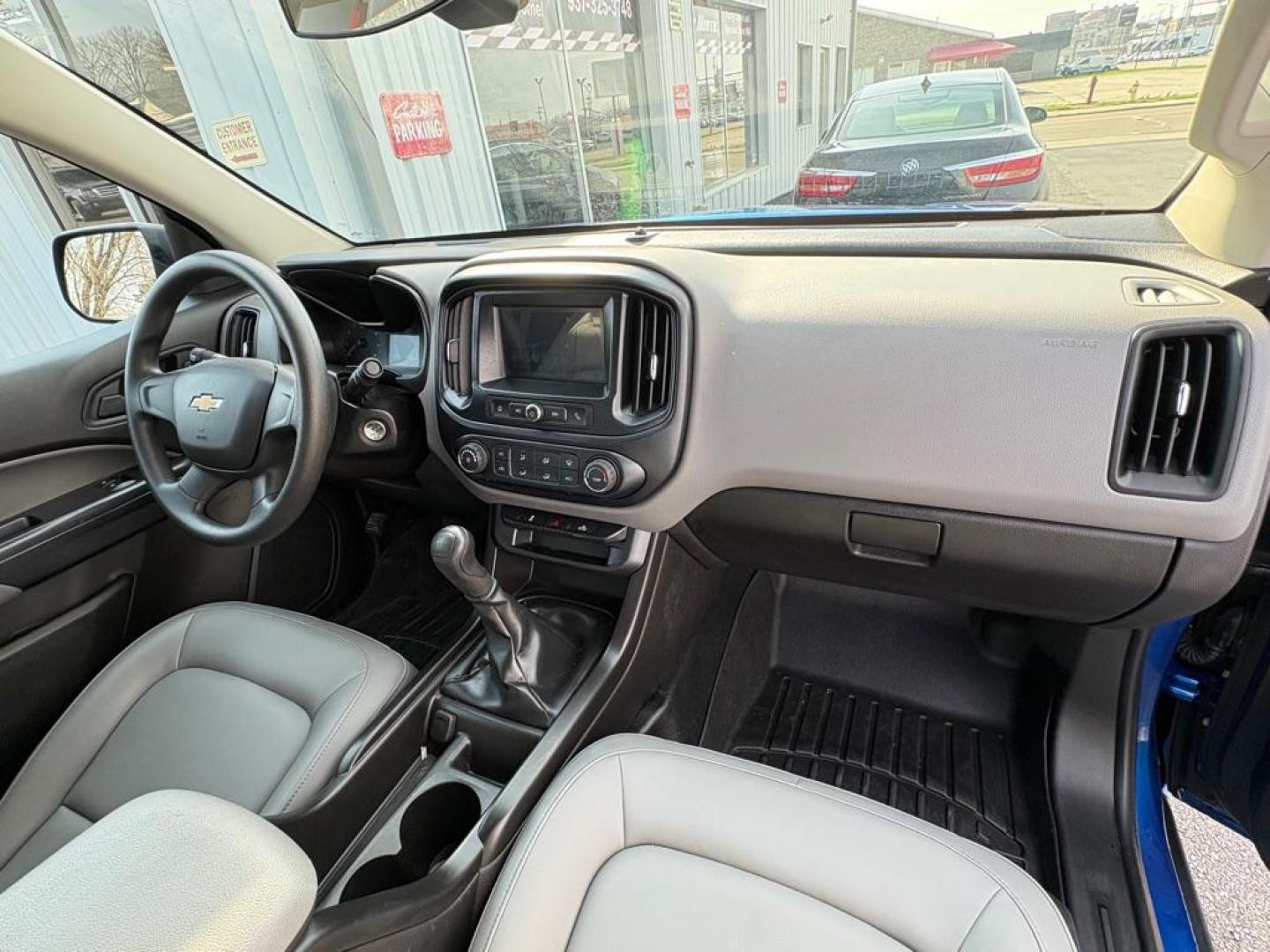 2018 BLUE CHEVROLET COLORADO (1GCHSAEAXJ1) with an 2.5L engine, 6-Speed Manual transmission, located at 501 E. Columbia St., Springfield, OH, 45503, (800) 262-7122, 39.925262, -83.801796 - *** Price Includes Documentation Fee! *** LOW MILES ***** Back Up Camera *** 6 Speed Manual **** Nice!!! *** Oil and filter change **** New Cabin and Air filter *** Jay North Auto has offered hand picked vehicles since 1965! Our customer's enjoy a NO pressure buying experience with a small town - Photo#17