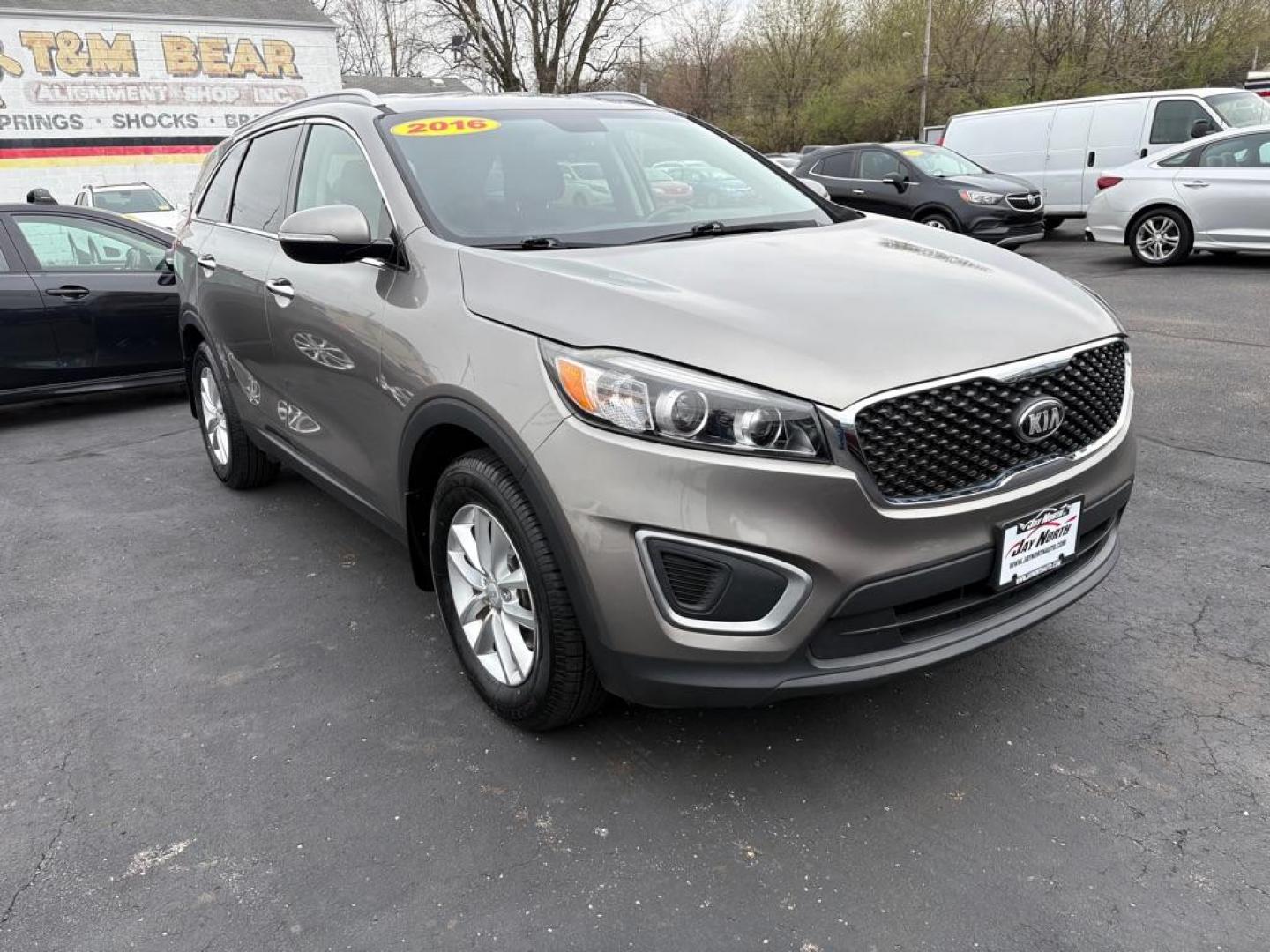 2016 GRAY KIA SORENTO LX (5XYPG4A36GG) with an 2.4L engine, Automatic transmission, located at 501 E. Columbia St., Springfield, OH, 45503, (800) 262-7122, 39.925262, -83.801796 - ***Price Includes Documentation Fee!***LX***Heated Seats***3rd Row Seating***All New Brake Pads and Rotors***New Tires***New Spark Plugs***New Wiper Blades***New Air Filter and Cabin Air Filter*** Jay North Auto has offered hand picked vehicles since 1965! Our customer's enjoy a NO pressure buy - Photo#0