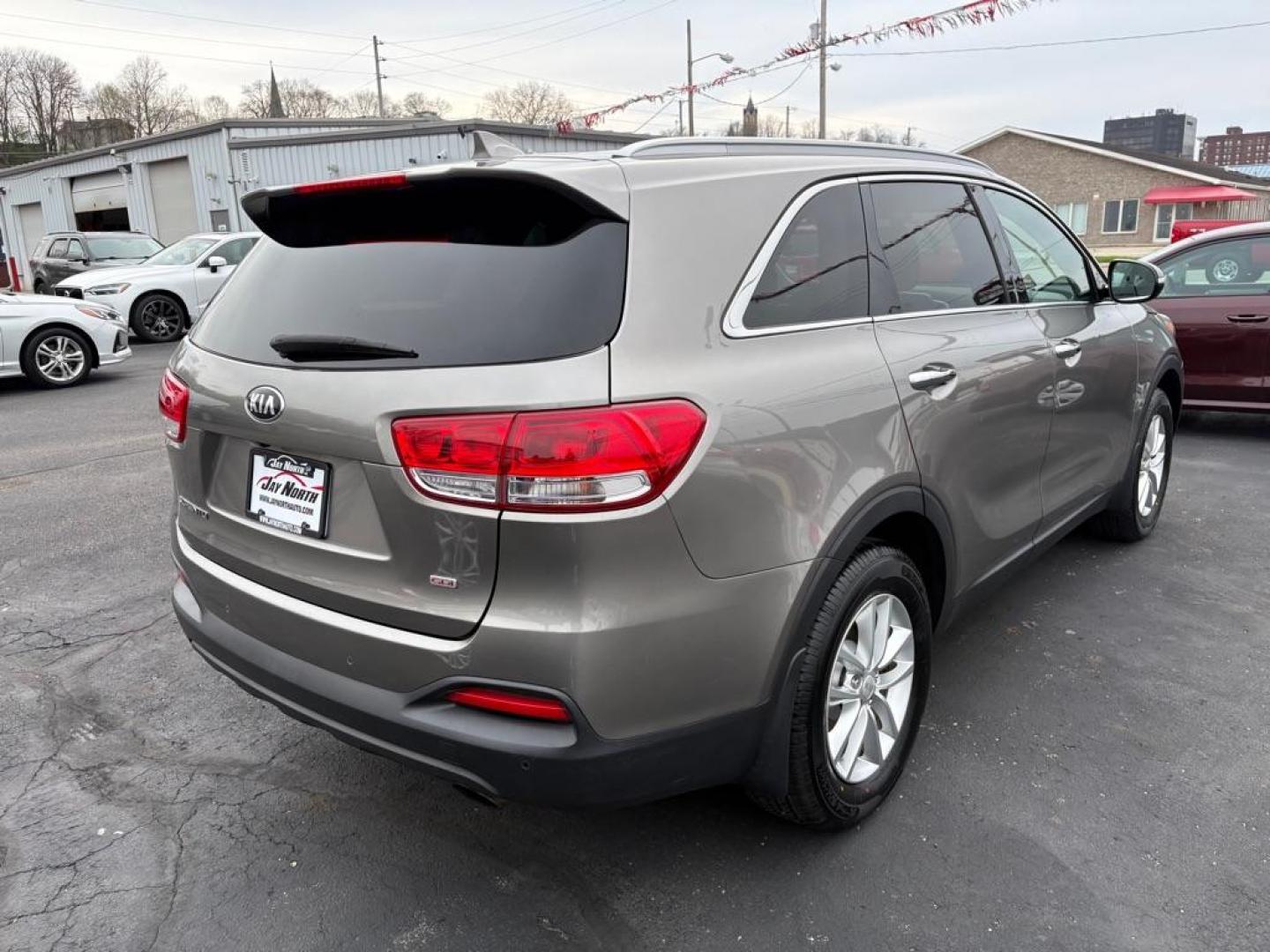 2016 GRAY KIA SORENTO LX (5XYPG4A36GG) with an 2.4L engine, Automatic transmission, located at 501 E. Columbia St., Springfield, OH, 45503, (800) 262-7122, 39.925262, -83.801796 - ***Price Includes Documentation Fee!***LX***Heated Seats***3rd Row Seating***All New Brake Pads and Rotors***New Tires***New Spark Plugs***New Wiper Blades***New Air Filter and Cabin Air Filter*** Jay North Auto has offered hand picked vehicles since 1965! Our customer's enjoy a NO pressure buy - Photo#2