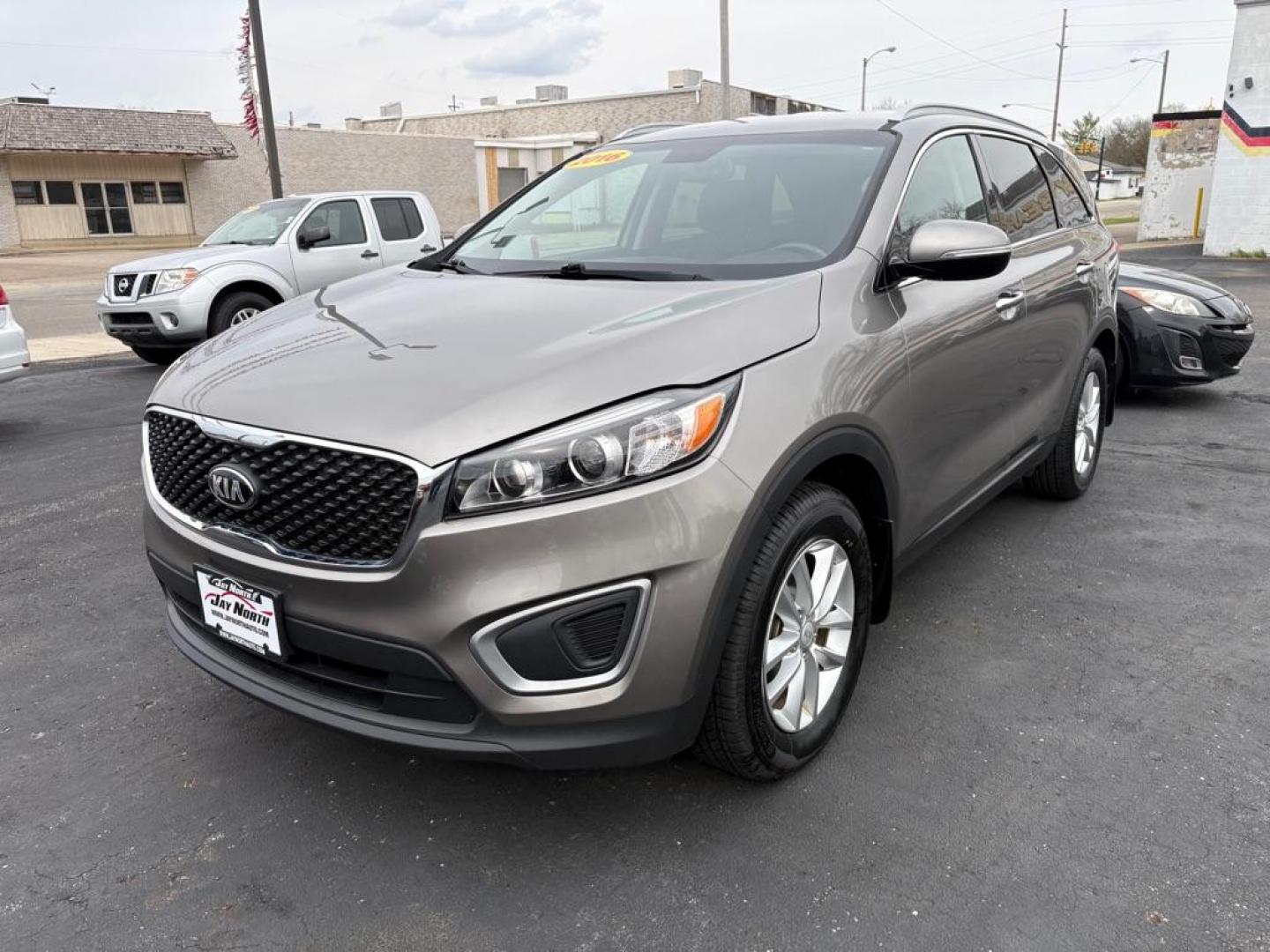 2016 GRAY KIA SORENTO LX (5XYPG4A36GG) with an 2.4L engine, Automatic transmission, located at 501 E. Columbia St., Springfield, OH, 45503, (800) 262-7122, 39.925262, -83.801796 - ***Price Includes Documentation Fee!***LX***Heated Seats***3rd Row Seating***All New Brake Pads and Rotors***New Tires***New Spark Plugs***New Wiper Blades***New Air Filter and Cabin Air Filter*** Jay North Auto has offered hand picked vehicles since 1965! Our customer's enjoy a NO pressure buy - Photo#5