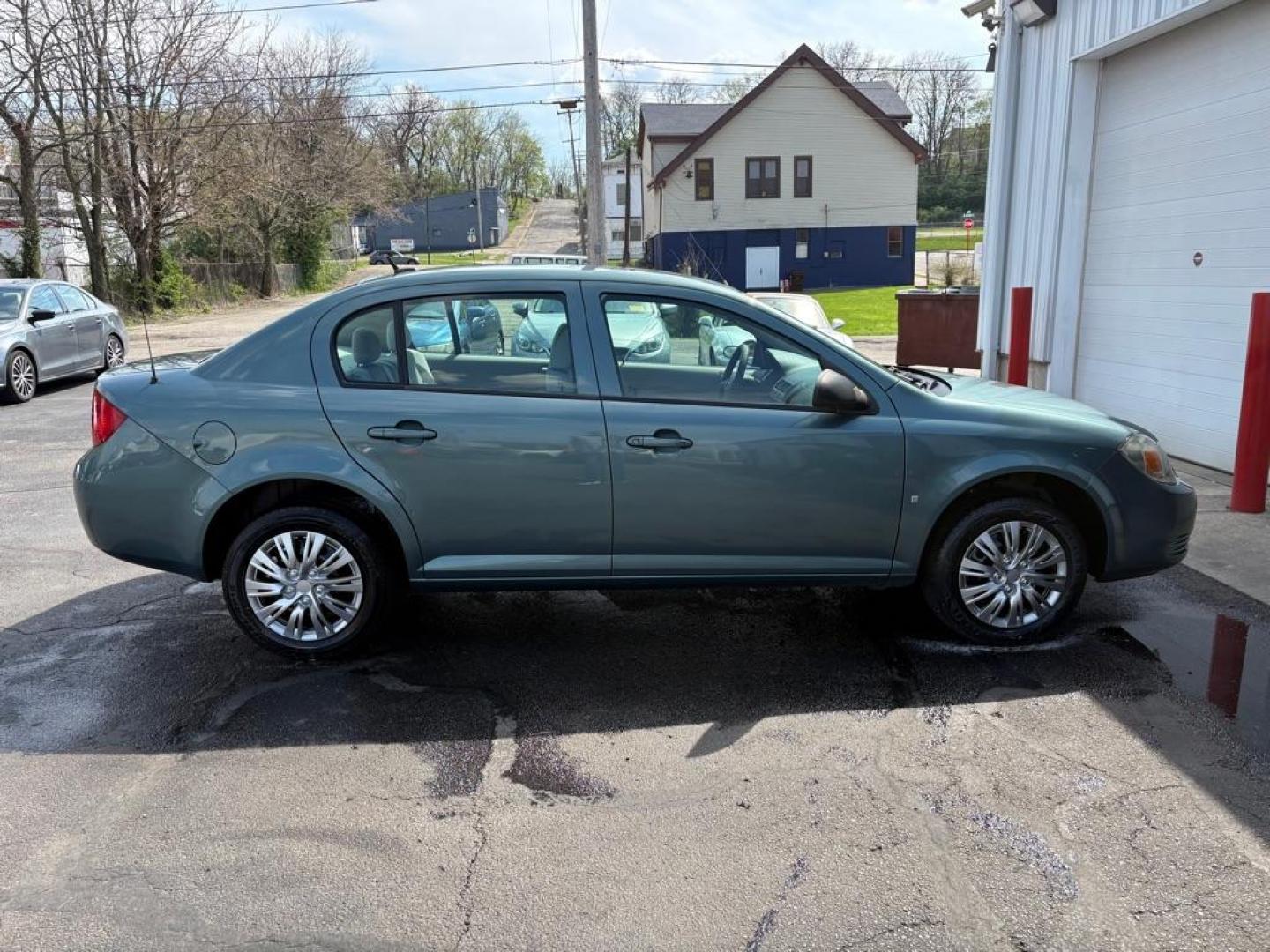 2009 GREEN CHEVROLET COBALT LS (1G1AK58H697) with an 2.2L engine, 5-Speed Manual transmission, located at 501 E. Columbia St., Springfield, OH, 45503, (800) 262-7122, 39.925262, -83.801796 - ***Price Includes Dealer Documentation Fee!***Only 78k Miles***Clean Carfax***LS***5-Speed***New Cabin Air Filter***New Wiper Blades***New Front Brake Pads and Rotors***New Serpentine Belt***New Rear Shocks and Coil Springs***New Front Control Arms and Alighment***Fresh Oil Change*** Jay North - Photo#1