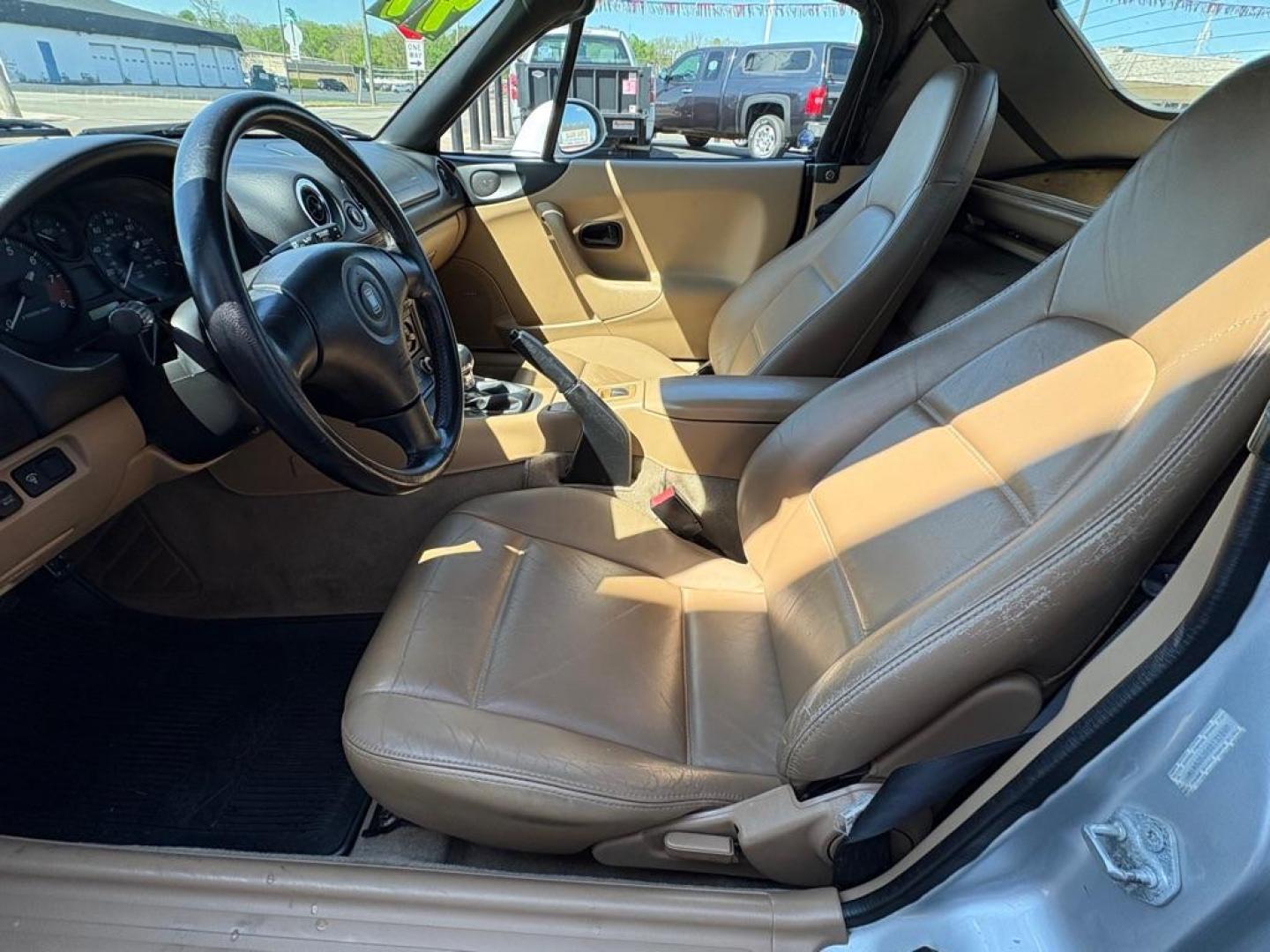 1999 SILVER MAZDA MX-5 MIATA (JM1NB3530X0) with an 1.8L engine, Automatic transmission, located at 501 E. Columbia St., Springfield, OH, 45503, (800) 262-7122, 39.925262, -83.801796 - *** New Tires *** New Top *** New Brakes *** Tune Up *** Oil Change *** New Belt *** New Harmonic Balancer *** Clean CarFax *** Jay North Auto has offered hand picked vehicles since 1965! Our customer's enjoy a NO pressure buying experience with a small town feel. We are a preferred dealer for - Photo#8