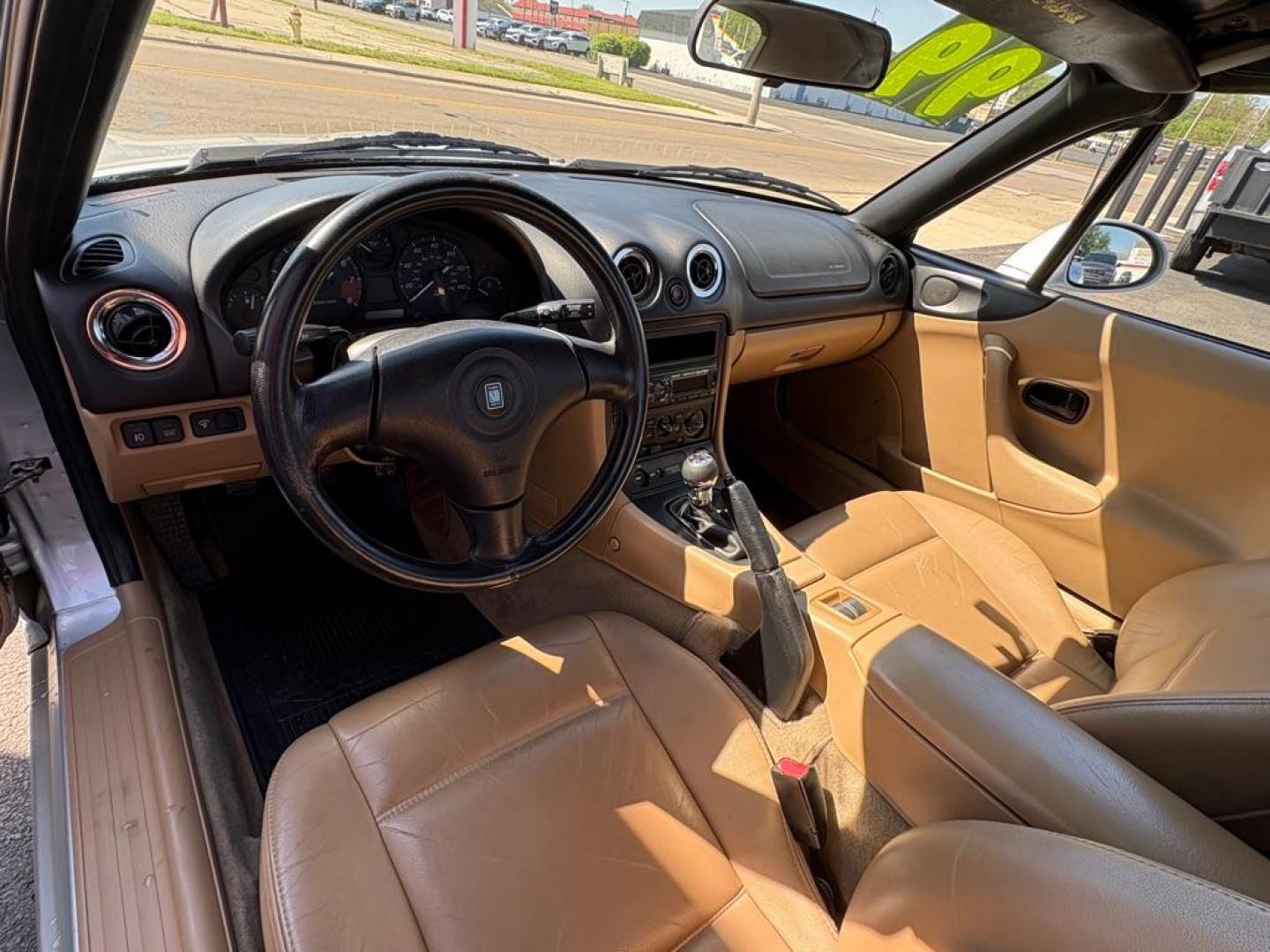 1999 SILVER MAZDA MX-5 MIATA (JM1NB3530X0) with an 1.8L engine, Automatic transmission, located at 501 E. Columbia St., Springfield, OH, 45503, (800) 262-7122, 39.925262, -83.801796 - *** New Tires *** New Top *** New Brakes *** Tune Up *** Oil Change *** New Belt *** New Harmonic Balancer *** Clean CarFax *** Jay North Auto has offered hand picked vehicles since 1965! Our customer's enjoy a NO pressure buying experience with a small town feel. We are a preferred dealer for - Photo#9