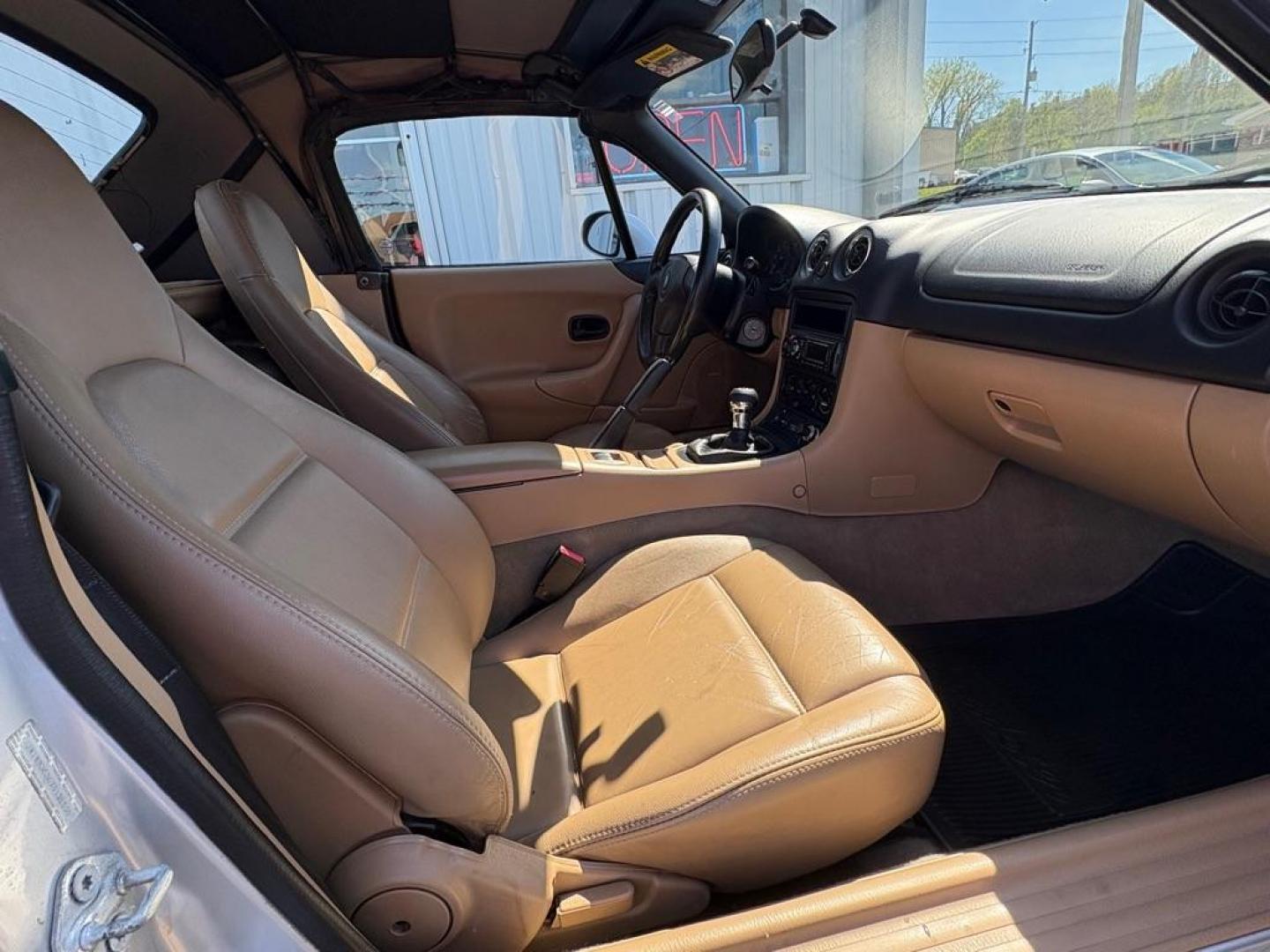 1999 SILVER MAZDA MX-5 MIATA (JM1NB3530X0) with an 1.8L engine, Automatic transmission, located at 501 E. Columbia St., Springfield, OH, 45503, (800) 262-7122, 39.925262, -83.801796 - *** New Tires *** New Top *** New Brakes *** Tune Up *** Oil Change *** New Belt *** New Harmonic Balancer *** Clean CarFax *** Jay North Auto has offered hand picked vehicles since 1965! Our customer's enjoy a NO pressure buying experience with a small town feel. We are a preferred dealer for - Photo#13