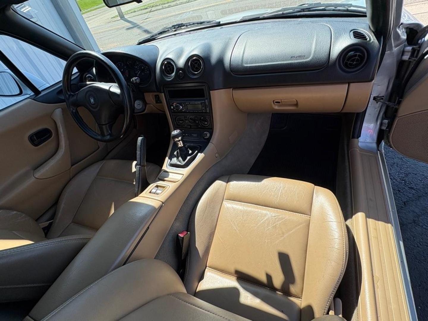 1999 SILVER MAZDA MX-5 MIATA (JM1NB3530X0) with an 1.8L engine, Automatic transmission, located at 501 E. Columbia St., Springfield, OH, 45503, (800) 262-7122, 39.925262, -83.801796 - *** New Tires *** New Top *** New Brakes *** Tune Up *** Oil Change *** New Belt *** New Harmonic Balancer *** Clean CarFax *** Jay North Auto has offered hand picked vehicles since 1965! Our customer's enjoy a NO pressure buying experience with a small town feel. We are a preferred dealer for - Photo#14