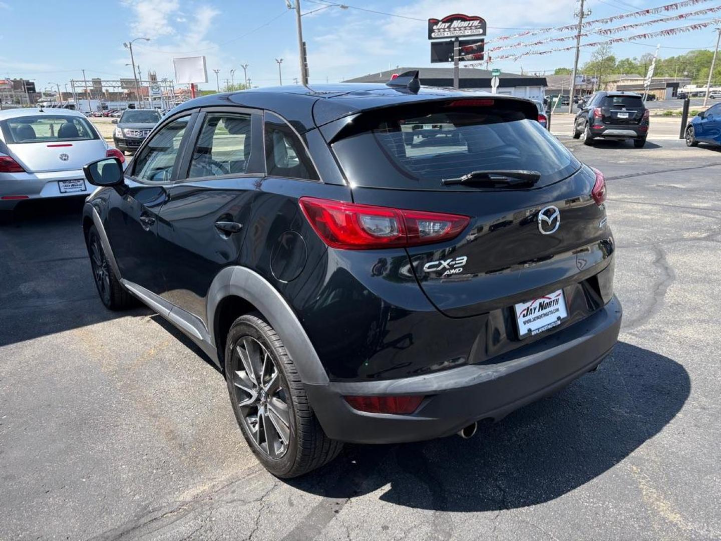 2016 BLACK MAZDA CX-3 GRAND TOURING (JM1DKBD76G0) with an 2.0L engine, Automatic transmission, located at 501 E. Columbia St., Springfield, OH, 45503, (800) 262-7122, 39.925262, -83.801796 - *** Clean CarFax *** Tune Up *** Newer Tires *** New Wipers *** New Brakes *** Oil Change ** Cabin and Air filters *** Inspection *** Back Up Camera *** Heated Seats *** Premium Audio *** Jay North Auto has offered hand picked vehicles since 1965! Our customer's enjoy a NO pressure buying experi - Photo#4