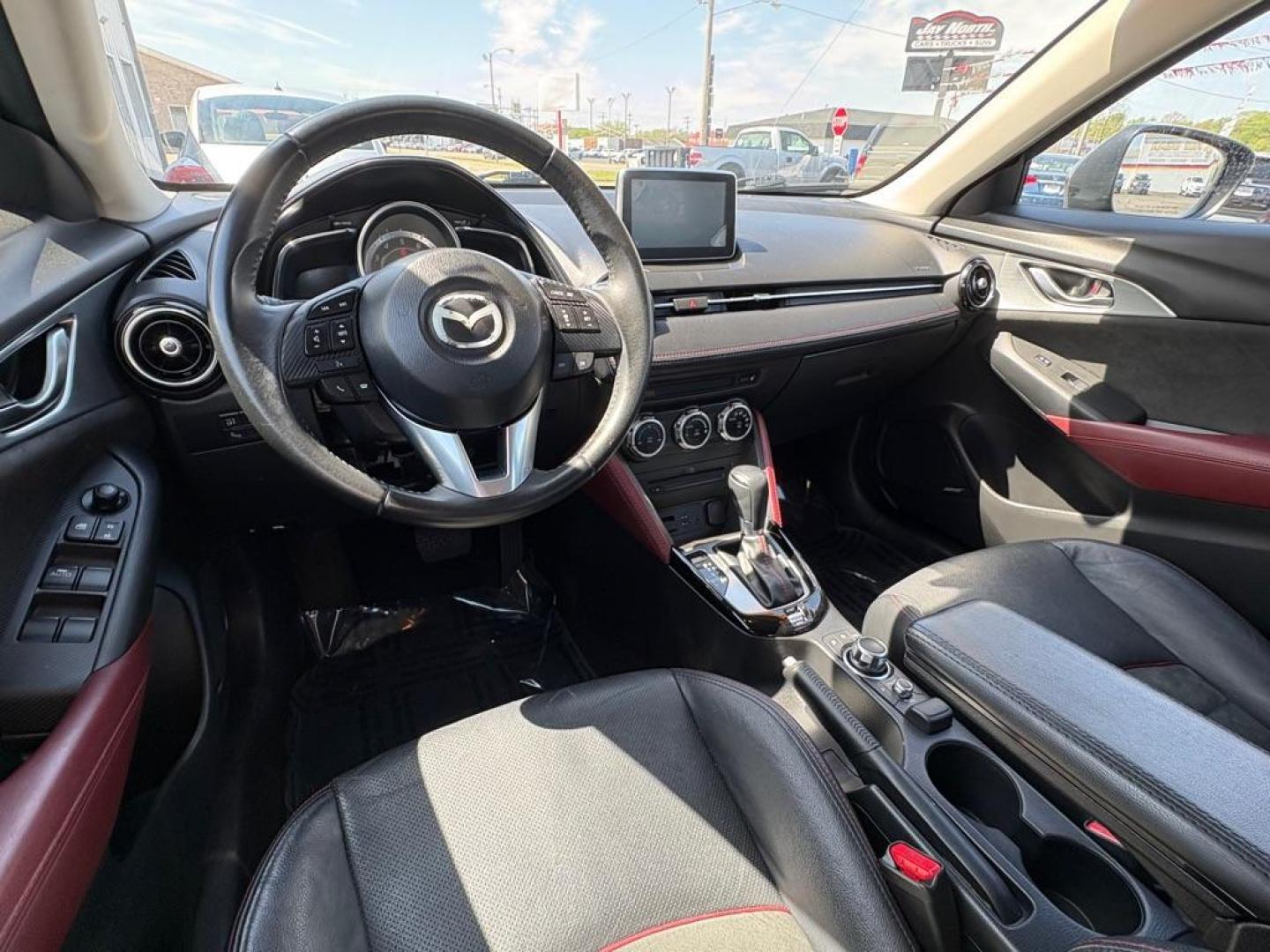 2016 BLACK MAZDA CX-3 GRAND TOURING (JM1DKBD76G0) with an 2.0L engine, Automatic transmission, located at 501 E. Columbia St., Springfield, OH, 45503, (800) 262-7122, 39.925262, -83.801796 - *** Clean CarFax *** Tune Up *** Newer Tires *** New Wipers *** New Brakes *** Oil Change ** Cabin and Air filters *** Inspection *** Back Up Camera *** Heated Seats *** Premium Audio *** Jay North Auto has offered hand picked vehicles since 1965! Our customer's enjoy a NO pressure buying experi - Photo#9