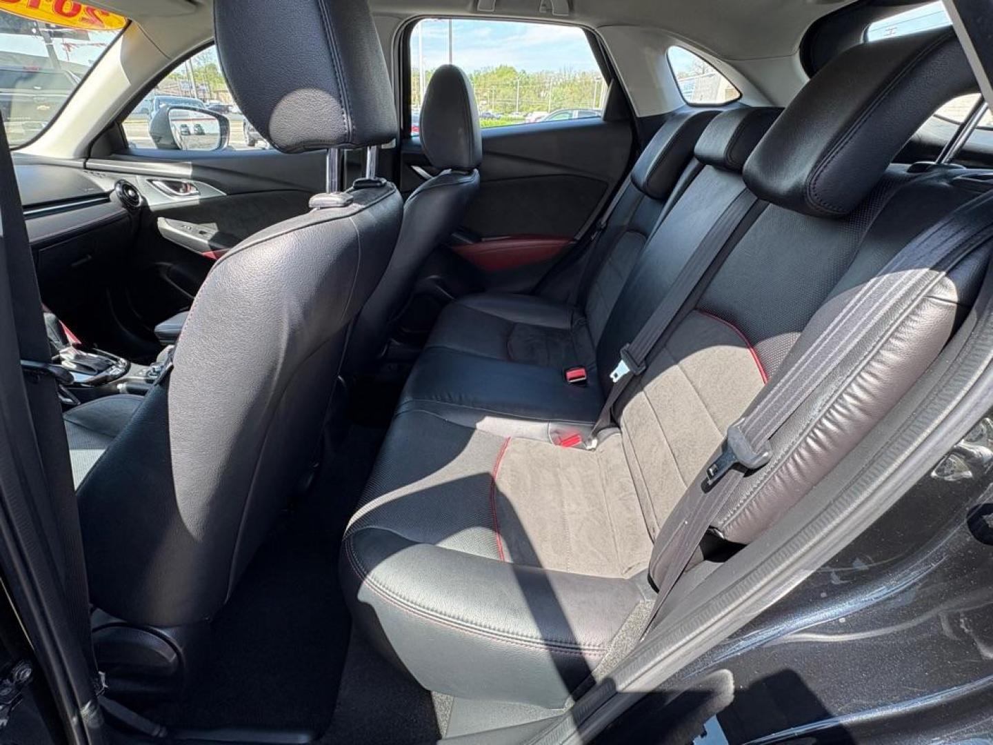 2016 BLACK MAZDA CX-3 GRAND TOURING (JM1DKBD76G0) with an 2.0L engine, Automatic transmission, located at 501 E. Columbia St., Springfield, OH, 45503, (800) 262-7122, 39.925262, -83.801796 - *** Clean CarFax *** Tune Up *** Newer Tires *** New Wipers *** New Brakes *** Oil Change ** Cabin and Air filters *** Inspection *** Back Up Camera *** Heated Seats *** Premium Audio *** Jay North Auto has offered hand picked vehicles since 1965! Our customer's enjoy a NO pressure buying experi - Photo#11