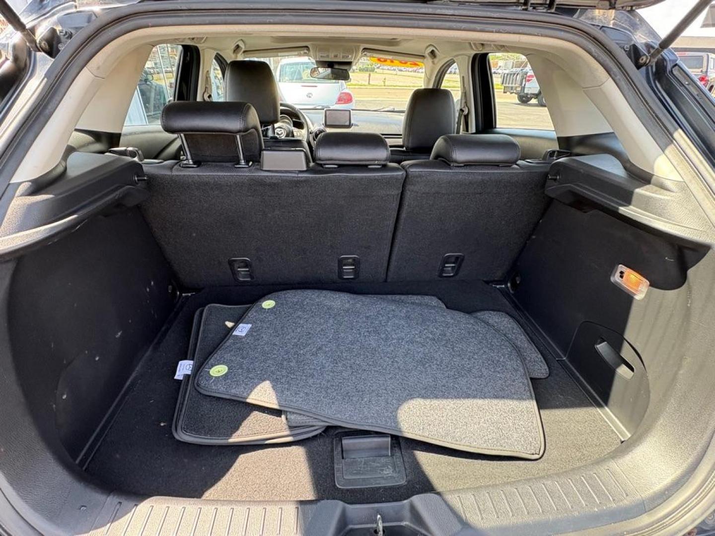 2016 BLACK MAZDA CX-3 GRAND TOURING (JM1DKBD76G0) with an 2.0L engine, Automatic transmission, located at 501 E. Columbia St., Springfield, OH, 45503, (800) 262-7122, 39.925262, -83.801796 - *** Clean CarFax *** Tune Up *** Newer Tires *** New Wipers *** New Brakes *** Oil Change ** Cabin and Air filters *** Inspection *** Back Up Camera *** Heated Seats *** Premium Audio *** Jay North Auto has offered hand picked vehicles since 1965! Our customer's enjoy a NO pressure buying experi - Photo#12