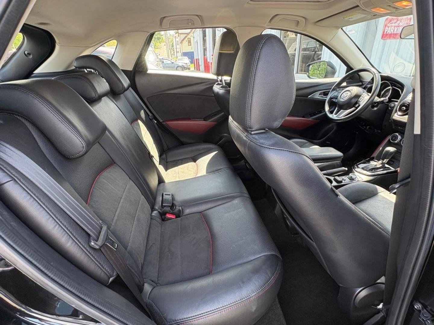 2016 BLACK MAZDA CX-3 GRAND TOURING (JM1DKBD76G0) with an 2.0L engine, Automatic transmission, located at 501 E. Columbia St., Springfield, OH, 45503, (800) 262-7122, 39.925262, -83.801796 - *** Clean CarFax *** Tune Up *** Newer Tires *** New Wipers *** New Brakes *** Oil Change ** Cabin and Air filters *** Inspection *** Back Up Camera *** Heated Seats *** Premium Audio *** Jay North Auto has offered hand picked vehicles since 1965! Our customer's enjoy a NO pressure buying experi - Photo#14