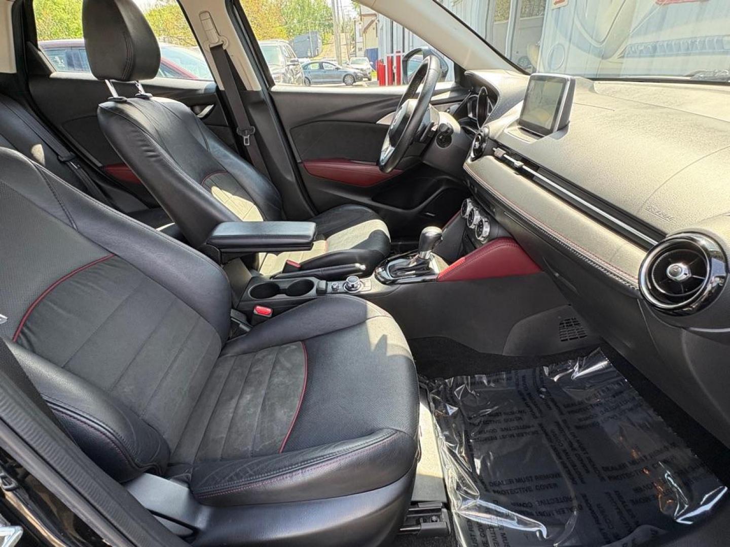 2016 BLACK MAZDA CX-3 GRAND TOURING (JM1DKBD76G0) with an 2.0L engine, Automatic transmission, located at 501 E. Columbia St., Springfield, OH, 45503, (800) 262-7122, 39.925262, -83.801796 - *** Clean CarFax *** Tune Up *** Newer Tires *** New Wipers *** New Brakes *** Oil Change ** Cabin and Air filters *** Inspection *** Back Up Camera *** Heated Seats *** Premium Audio *** Jay North Auto has offered hand picked vehicles since 1965! Our customer's enjoy a NO pressure buying experi - Photo#16