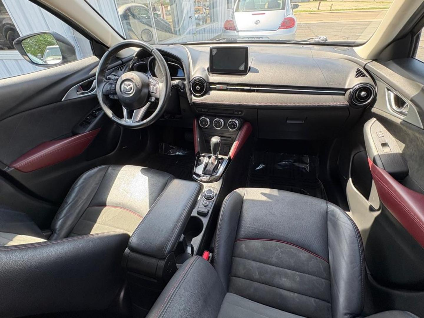 2016 BLACK MAZDA CX-3 GRAND TOURING (JM1DKBD76G0) with an 2.0L engine, Automatic transmission, located at 501 E. Columbia St., Springfield, OH, 45503, (800) 262-7122, 39.925262, -83.801796 - *** Clean CarFax *** Tune Up *** Newer Tires *** New Wipers *** New Brakes *** Oil Change ** Cabin and Air filters *** Inspection *** Back Up Camera *** Heated Seats *** Premium Audio *** Jay North Auto has offered hand picked vehicles since 1965! Our customer's enjoy a NO pressure buying experi - Photo#17