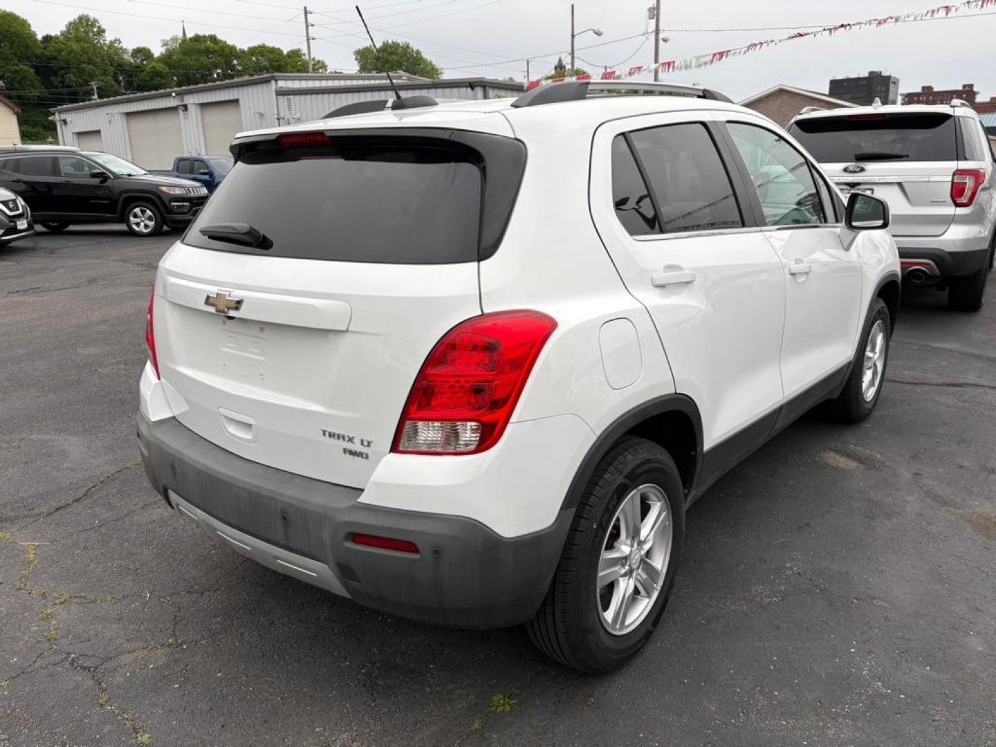 2015 WHITE CHEVROLET TRAX 1LT (3GNCJRSB6FL) with an 1.4L engine, Automatic transmission, located at 501 E. Columbia St., Springfield, OH, 45503, (800) 262-7122, 39.925262, -83.801796 - *** New Tires *** New Turbo *** New Catalytic Converter *** New 02 sensors *** New Cabin and Air filter *** Tune Up *** New Wipers *** New TPMS sensors *** Oil Change *** Jay North Auto has offered hand picked vehicles since 1965! Our customer's enjoy a NO pressure buying experience with a smal - Photo#2