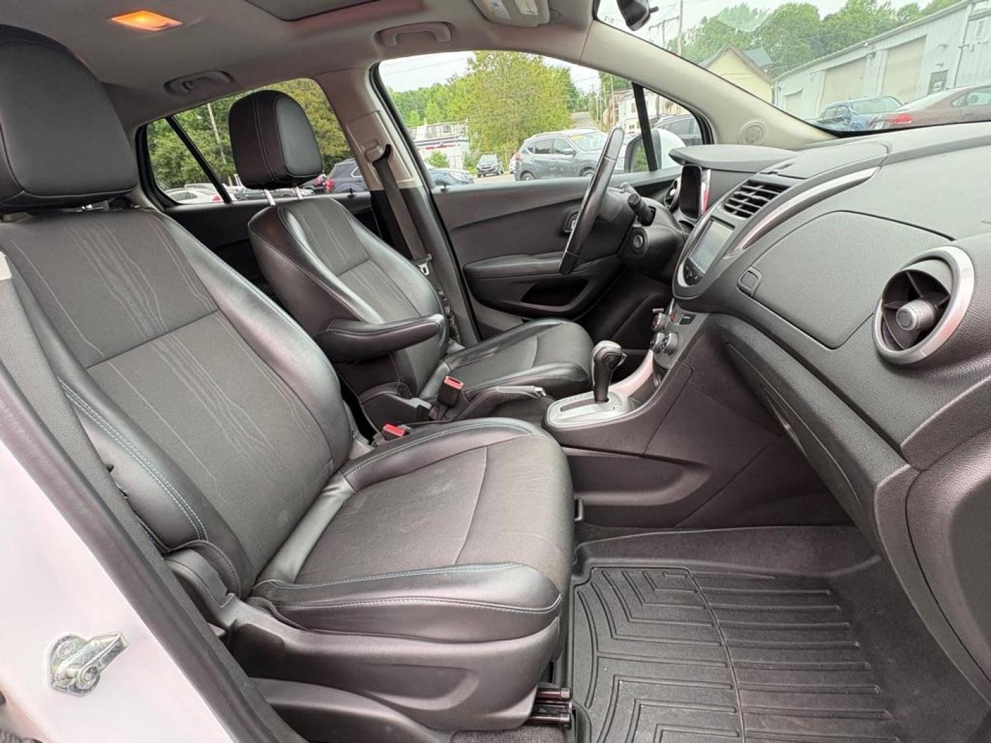 2015 WHITE CHEVROLET TRAX 1LT (3GNCJRSB6FL) with an 1.4L engine, Automatic transmission, located at 501 E. Columbia St., Springfield, OH, 45503, (800) 262-7122, 39.925262, -83.801796 - *** New Tires *** New Turbo *** New Catalytic Converter *** New 02 sensors *** New Cabin and Air filter *** Tune Up *** New Wipers *** New TPMS sensors *** Oil Change *** Jay North Auto has offered hand picked vehicles since 1965! Our customer's enjoy a NO pressure buying experience with a smal - Photo#16