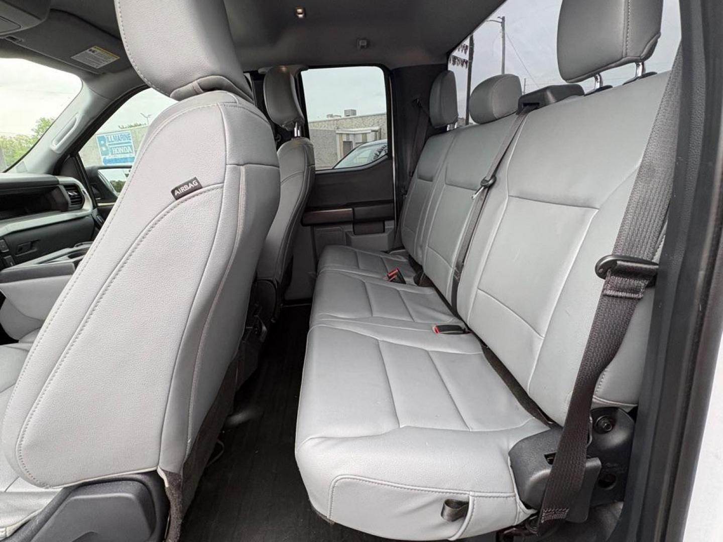 2022 WHITE FORD F150 SUPER CAB (1FTEX1CB7NF) with an 3.3L engine, Automatic transmission, located at 501 E. Columbia St., Springfield, OH, 45503, (800) 262-7122, 39.925262, -83.801796 - *** XL V6 *** Clean CarFax *** New Tires *** New Brakes *** Oil Change *** New Cabin and Air filter *** Hard Bed Cover *** Jay North Auto has offered hand picked vehicles since 1965! Our customer's enjoy a NO pressure buying experience with a small town feel. We are a preferred dealer for ma - Photo#9