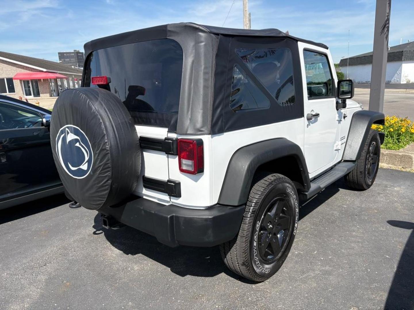 2014 WHITE JEEP WRANGLER SPORT (1C4AJWAG6EL) with an 3.6L engine, 6-Speed Manual transmission, located at 501 E. Columbia St., Springfield, OH, 45503, (800) 262-7122, 39.925262, -83.801796 - *** 1 Owner *** New Top w/ tint *** Sport *** Oil Change *** Inspection *** New Wipers *** Air filter *** NICE *** V6 *** 4x4 *** Jay North Auto has offered hand picked vehicles since 1965! Our customer's enjoy a NO pressure buying experience with a small town feel. We are a preferred dealer f - Photo#1