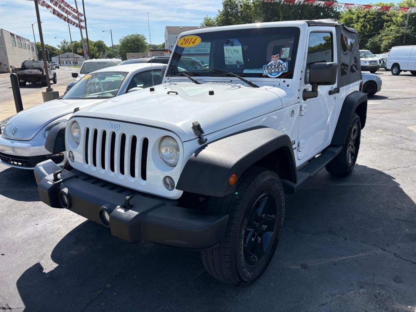 2014 WHITE JEEP WRANGLER SPORT (1C4AJWAG6EL) with an 3.6L engine, 6-Speed Manual transmission, located at 501 E. Columbia St., Springfield, OH, 45503, (800) 262-7122, 39.925262, -83.801796 - *** 1 Owner *** New Top w/ tint *** Sport *** Oil Change *** Inspection *** New Wipers *** Air filter *** NICE *** V6 *** 4x4 *** Jay North Auto has offered hand picked vehicles since 1965! Our customer's enjoy a NO pressure buying experience with a small town feel. We are a preferred dealer f - Photo#4