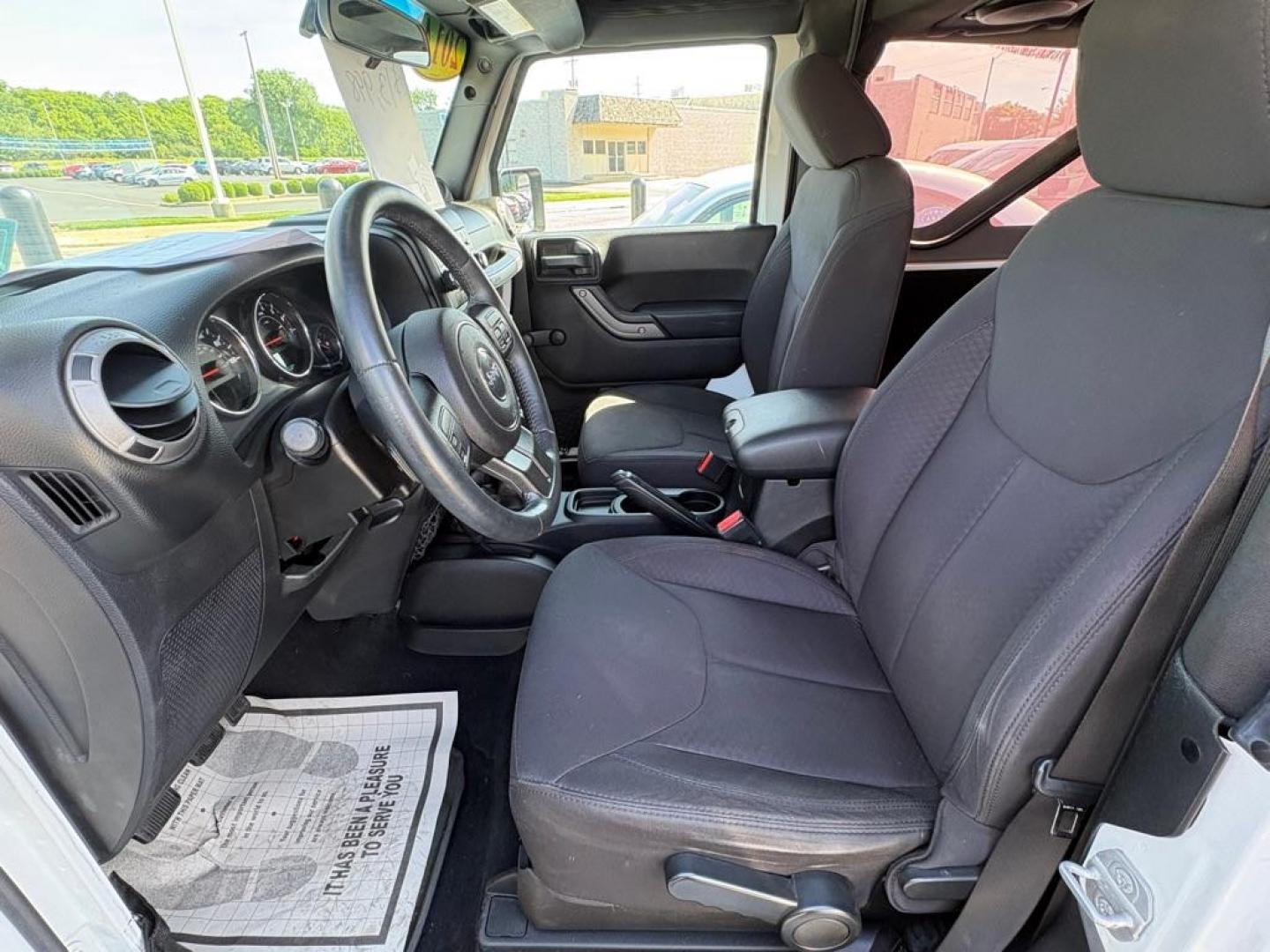 2014 WHITE JEEP WRANGLER SPORT (1C4AJWAG6EL) with an 3.6L engine, 6-Speed Manual transmission, located at 501 E. Columbia St., Springfield, OH, 45503, (800) 262-7122, 39.925262, -83.801796 - *** 1 Owner *** New Top w/ tint *** Sport *** Oil Change *** Inspection *** New Wipers *** Air filter *** NICE *** V6 *** 4x4 *** Jay North Auto has offered hand picked vehicles since 1965! Our customer's enjoy a NO pressure buying experience with a small town feel. We are a preferred dealer f - Photo#7
