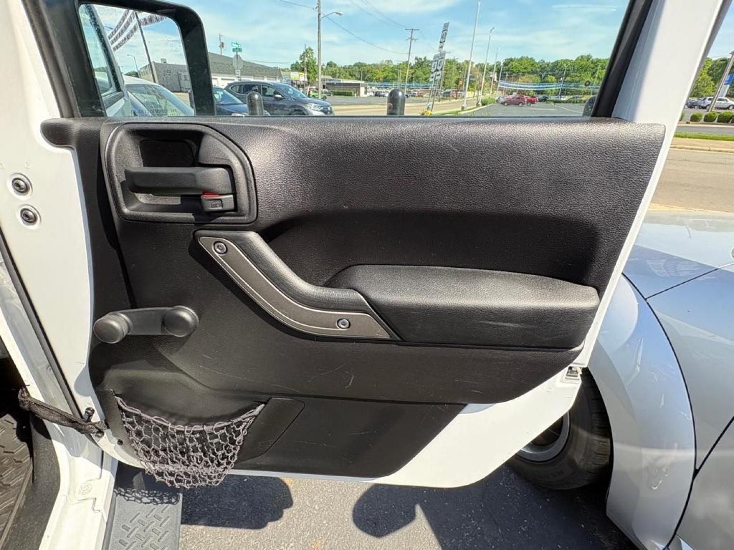 2014 WHITE JEEP WRANGLER SPORT (1C4AJWAG6EL) with an 3.6L engine, 6-Speed Manual transmission, located at 501 E. Columbia St., Springfield, OH, 45503, (800) 262-7122, 39.925262, -83.801796 - *** 1 Owner *** New Top w/ tint *** Sport *** Oil Change *** Inspection *** New Wipers *** Air filter *** NICE *** V6 *** 4x4 *** Jay North Auto has offered hand picked vehicles since 1965! Our customer's enjoy a NO pressure buying experience with a small town feel. We are a preferred dealer f - Photo#11