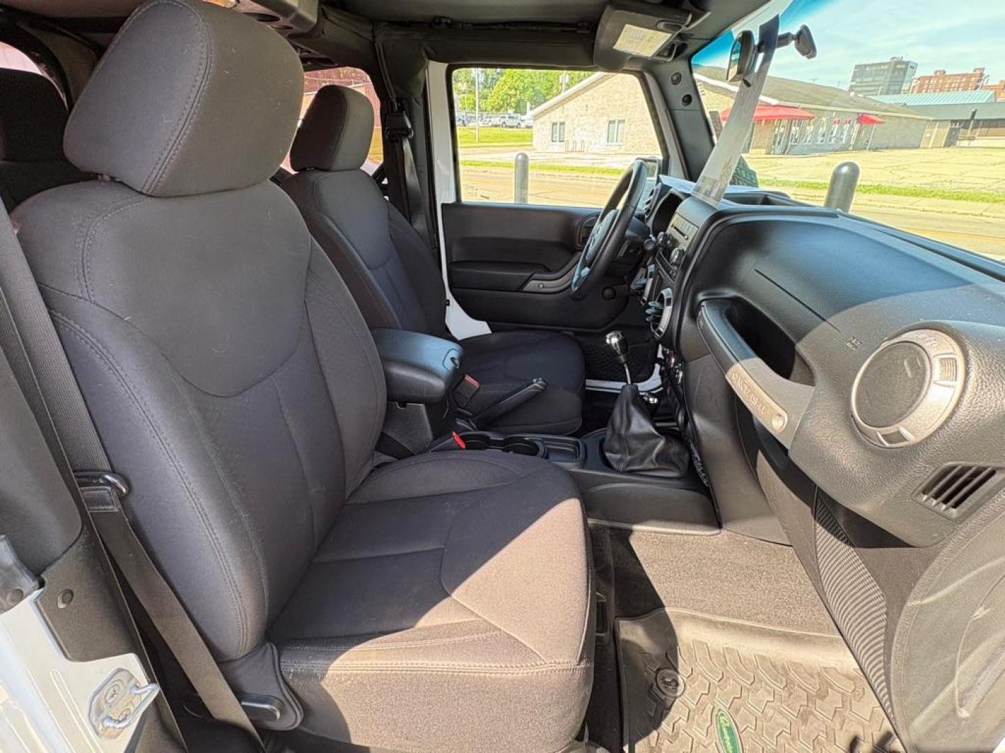2014 WHITE JEEP WRANGLER SPORT (1C4AJWAG6EL) with an 3.6L engine, 6-Speed Manual transmission, located at 501 E. Columbia St., Springfield, OH, 45503, (800) 262-7122, 39.925262, -83.801796 - *** 1 Owner *** New Top w/ tint *** Sport *** Oil Change *** Inspection *** New Wipers *** Air filter *** NICE *** V6 *** 4x4 *** Jay North Auto has offered hand picked vehicles since 1965! Our customer's enjoy a NO pressure buying experience with a small town feel. We are a preferred dealer f - Photo#12