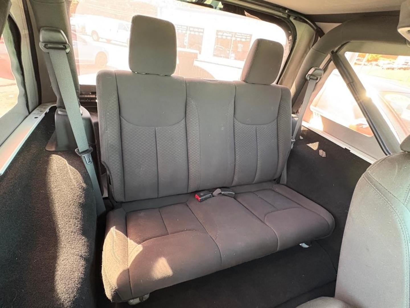 2014 WHITE JEEP WRANGLER SPORT (1C4AJWAG6EL) with an 3.6L engine, 6-Speed Manual transmission, located at 501 E. Columbia St., Springfield, OH, 45503, (800) 262-7122, 39.925262, -83.801796 - *** 1 Owner *** New Top w/ tint *** Sport *** Oil Change *** Inspection *** New Wipers *** Air filter *** NICE *** V6 *** 4x4 *** Jay North Auto has offered hand picked vehicles since 1965! Our customer's enjoy a NO pressure buying experience with a small town feel. We are a preferred dealer f - Photo#13