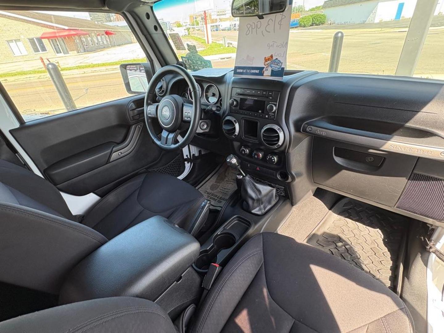 2014 WHITE JEEP WRANGLER SPORT (1C4AJWAG6EL) with an 3.6L engine, 6-Speed Manual transmission, located at 501 E. Columbia St., Springfield, OH, 45503, (800) 262-7122, 39.925262, -83.801796 - *** 1 Owner *** New Top w/ tint *** Sport *** Oil Change *** Inspection *** New Wipers *** Air filter *** NICE *** V6 *** 4x4 *** Jay North Auto has offered hand picked vehicles since 1965! Our customer's enjoy a NO pressure buying experience with a small town feel. We are a preferred dealer f - Photo#14