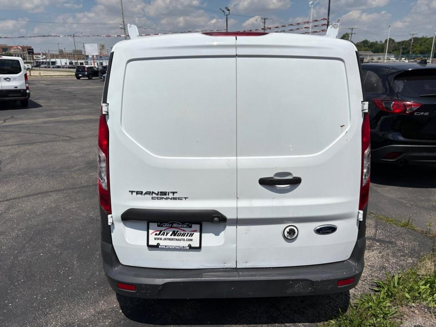 2015 WHITE FORD TRANSIT CONNECT XL (NM0LS7E72F1) with an 2.5L engine, Automatic transmission, located at 501 E. Columbia St., Springfield, OH, 45503, (800) 262-7122, 39.925262, -83.801796 - Jay North Auto has offered hand picked vehicles since 1965! Our customer's enjoy a NO pressure buying experience with a small town feel. We are a preferred dealer for many local credit unions and lenders. Bad credit? No Credit/First time buyer? Open or closed BANKRUPTCY 7 or 13? We Can Help Apply - Photo#2