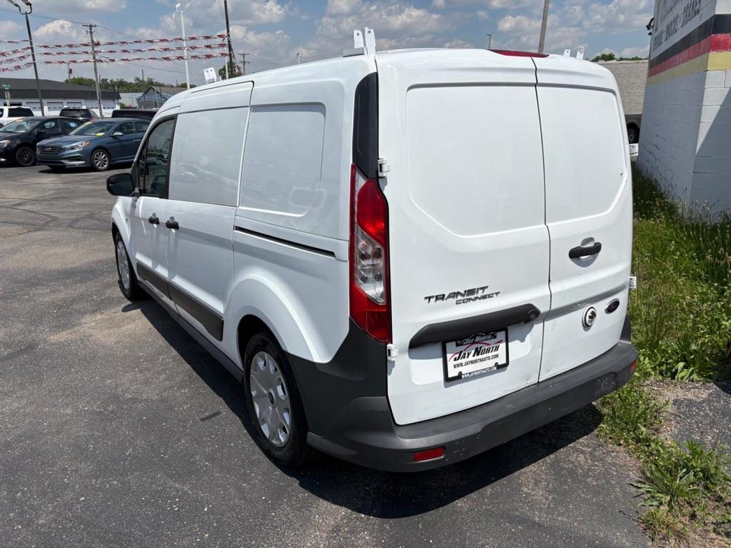 2015 WHITE FORD TRANSIT CONNECT XL (NM0LS7E72F1) with an 2.5L engine, Automatic transmission, located at 501 E. Columbia St., Springfield, OH, 45503, (800) 262-7122, 39.925262, -83.801796 - Jay North Auto has offered hand picked vehicles since 1965! Our customer's enjoy a NO pressure buying experience with a small town feel. We are a preferred dealer for many local credit unions and lenders. Bad credit? No Credit/First time buyer? Open or closed BANKRUPTCY 7 or 13? We Can Help Apply - Photo#3