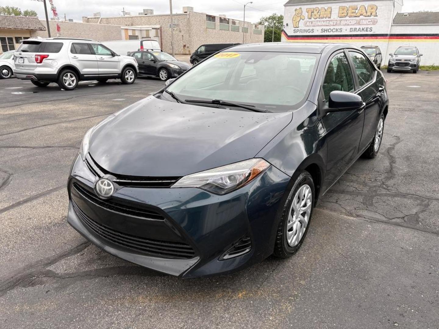 2017 BLUE TOYOTA COROLLA LE (2T1BURHE4HC) with an 1.8L engine, Continuously Variable transmission, located at 501 E. Columbia St., Springfield, OH, 45503, (800) 262-7122, 39.925262, -83.801796 - ***Clean Carfax***LE***New Spark Plugs***New Wipers***NEW TIRES***New Front Brakes***New Air Filter and Cabin Air Filter***Fresh Oil Change*** Jay North Auto has offered hand picked vehicles since 1965! Our customer's enjoy a NO pressure buying experience with a small town feel. We are a pref - Photo#5