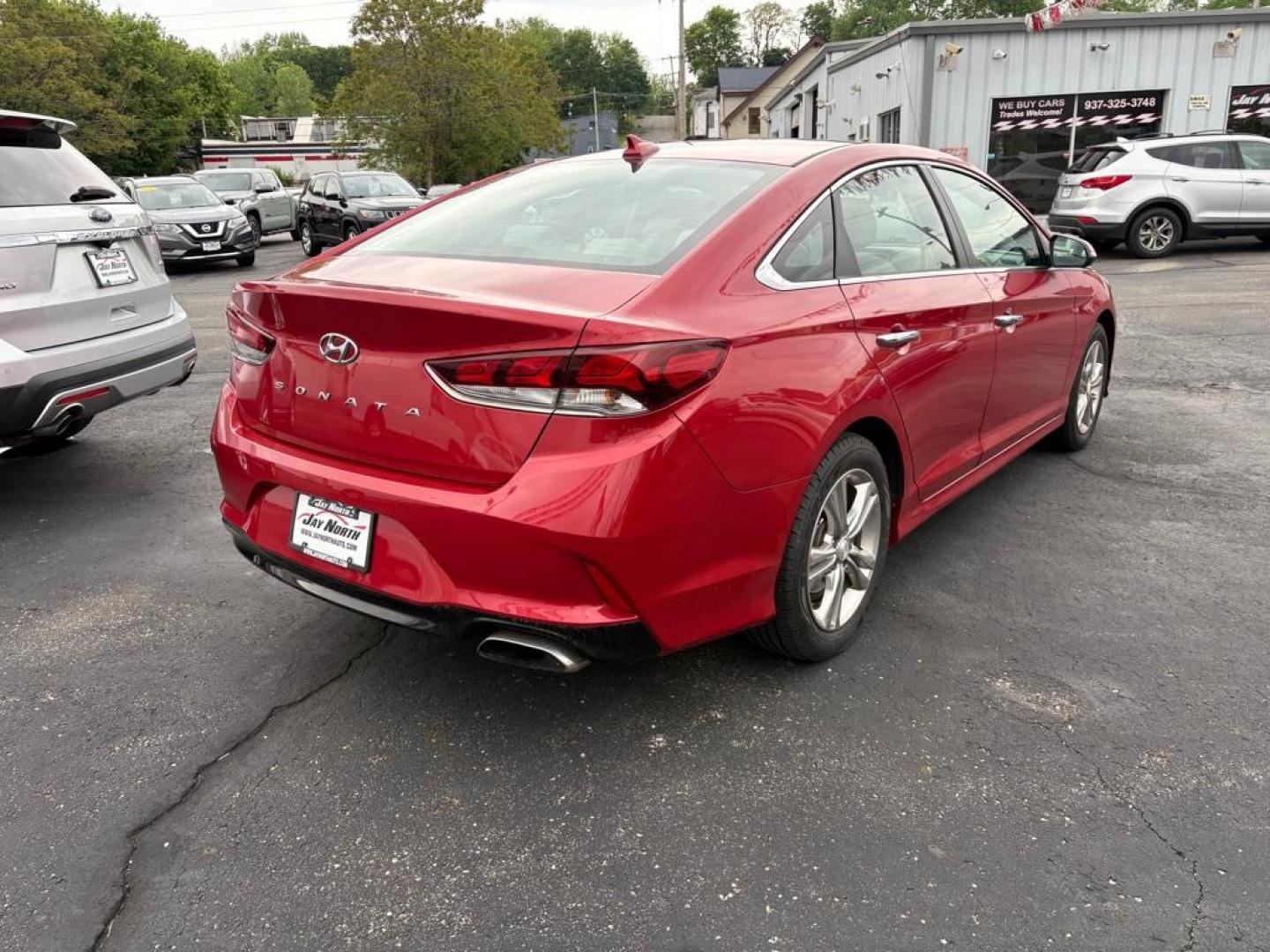 2019 RED HYUNDAI SONATA LIMITED (5NPE34AF6KH) with an 2.4L engine, Automatic transmission, located at 501 E. Columbia St., Springfield, OH, 45503, (800) 262-7122, 39.925262, -83.801796 - *** One Owner *** Tune Up *** New Brakes *** New Wipers *** Oil Change *** Air and Cabin Filter *** Apple CarPlay *** Jay North Auto has offered hand picked vehicles since 1965! Our customer's enjoy a NO pressure buying experience with a small town feel. We are a preferred dealer for many loca - Photo#2