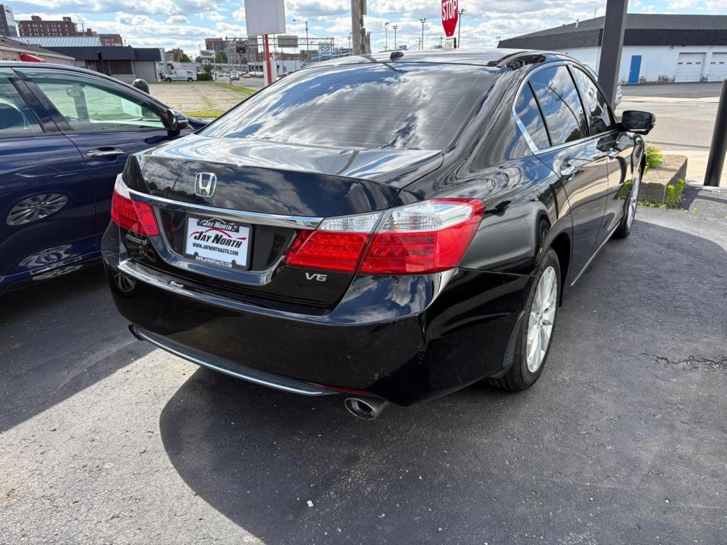 2015 BLACK HONDA ACCORD EXL (1HGCR3F80FA) with an 3.5L engine, Automatic transmission, located at 501 E. Columbia St., Springfield, OH, 45503, (800) 262-7122, 39.925262, -83.801796 - *** New Tires *** New Brakes *** Oil Change *** Moonroof *** V6 *** EXL *** Inspection *** Tune Up *** New Cabin and Air Filter *** Leather Heated Seats *** Back Up Camera *** Premium Audio *** Jay North Auto has offered hand picked vehicles since 1965! Our customer's enjoy a NO pressure buying- Photo#1