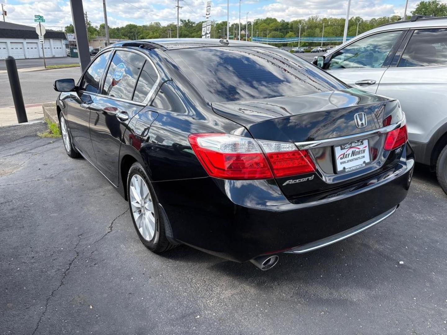 2015 BLACK HONDA ACCORD EXL (1HGCR3F80FA) with an 3.5L engine, Automatic transmission, located at 501 E. Columbia St., Springfield, OH, 45503, (800) 262-7122, 39.925262, -83.801796 - *** New Tires *** New Brakes *** Oil Change *** Moonroof *** V6 *** EXL *** Inspection *** Tune Up *** New Cabin and Air Filter *** Leather Heated Seats *** Back Up Camera *** Premium Audio *** Jay North Auto has offered hand picked vehicles since 1965! Our customer's enjoy a NO pressure buying- Photo#3