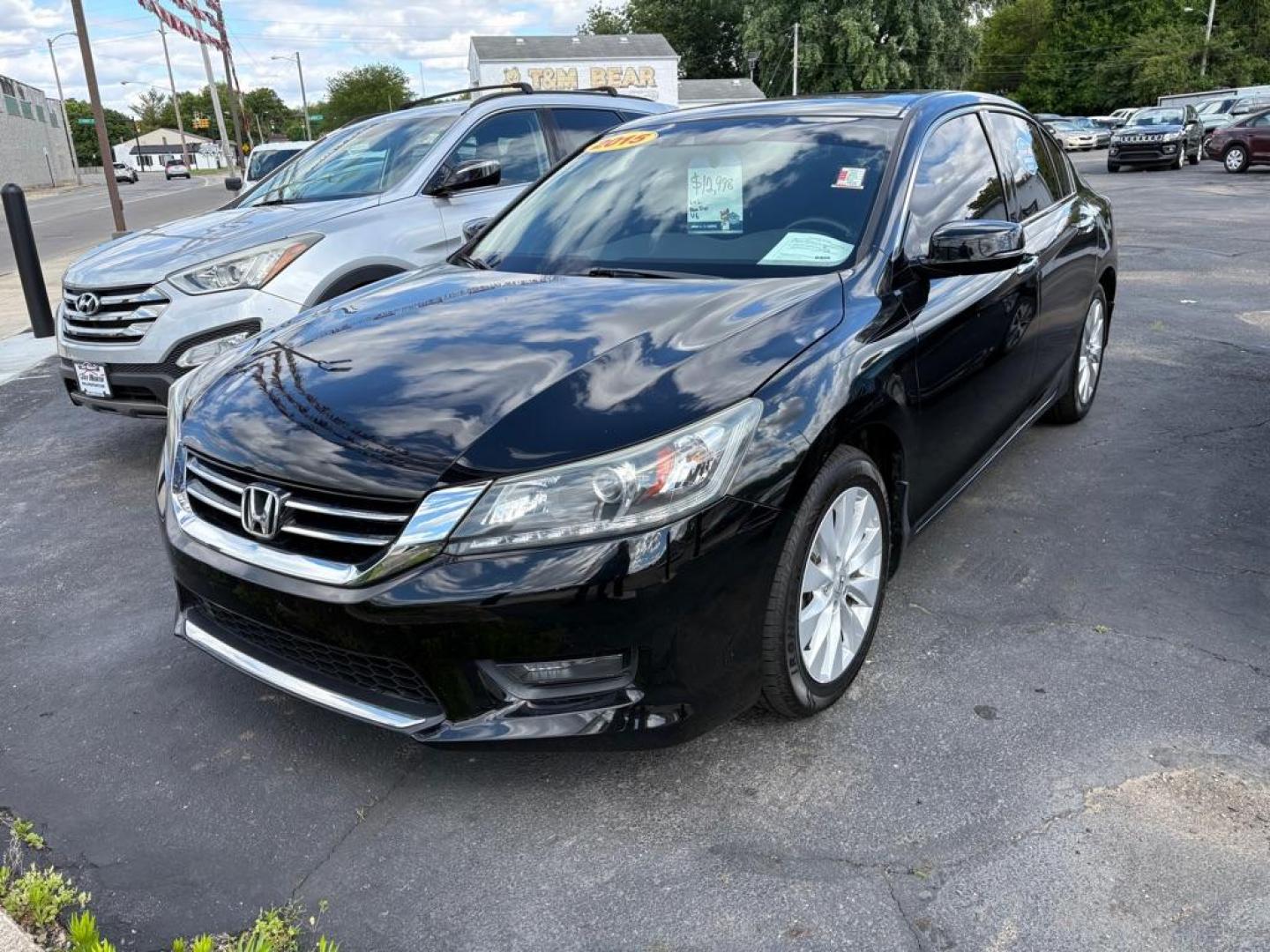 2015 BLACK HONDA ACCORD EXL (1HGCR3F80FA) with an 3.5L engine, Automatic transmission, located at 501 E. Columbia St., Springfield, OH, 45503, (800) 262-7122, 39.925262, -83.801796 - *** New Tires *** New Brakes *** Oil Change *** Moonroof *** V6 *** EXL *** Inspection *** Tune Up *** New Cabin and Air Filter *** Leather Heated Seats *** Back Up Camera *** Premium Audio *** Jay North Auto has offered hand picked vehicles since 1965! Our customer's enjoy a NO pressure buying- Photo#4