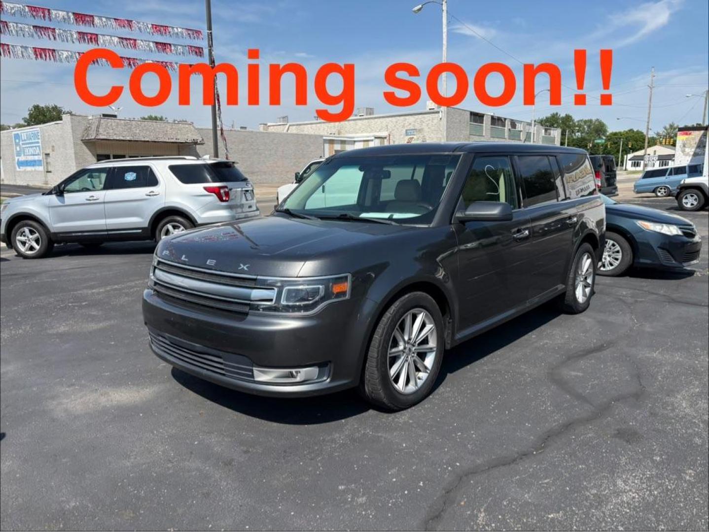 2016 GRAY FORD FLEX LIMITED (2FMHK6D80GB) with an 3.5L engine, Automatic transmission, located at 501 E. Columbia St., Springfield, OH, 45503, (800) 262-7122, 39.925262, -83.801796 - Photo#0