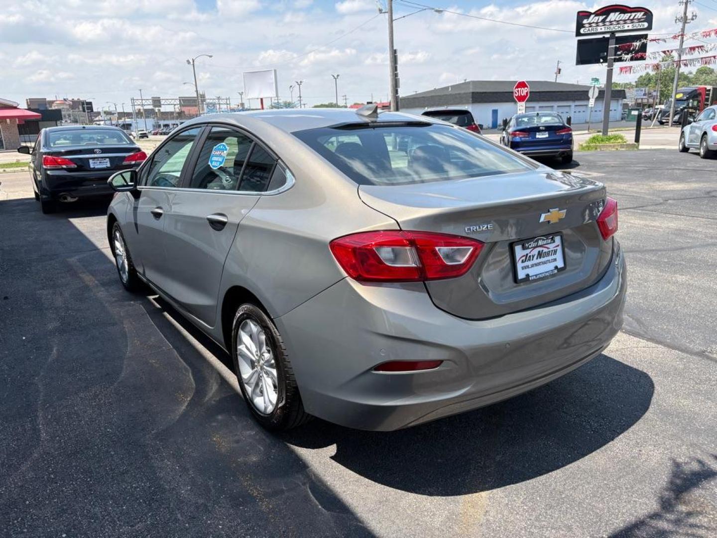 2019 BROWN CHEVROLET CRUZE LT (1G1BE5SM7K7) with an 1.4L engine, Automatic transmission, located at 501 E. Columbia St., Springfield, OH, 45503, (800) 262-7122, 39.925262, -83.801796 - Photo#4