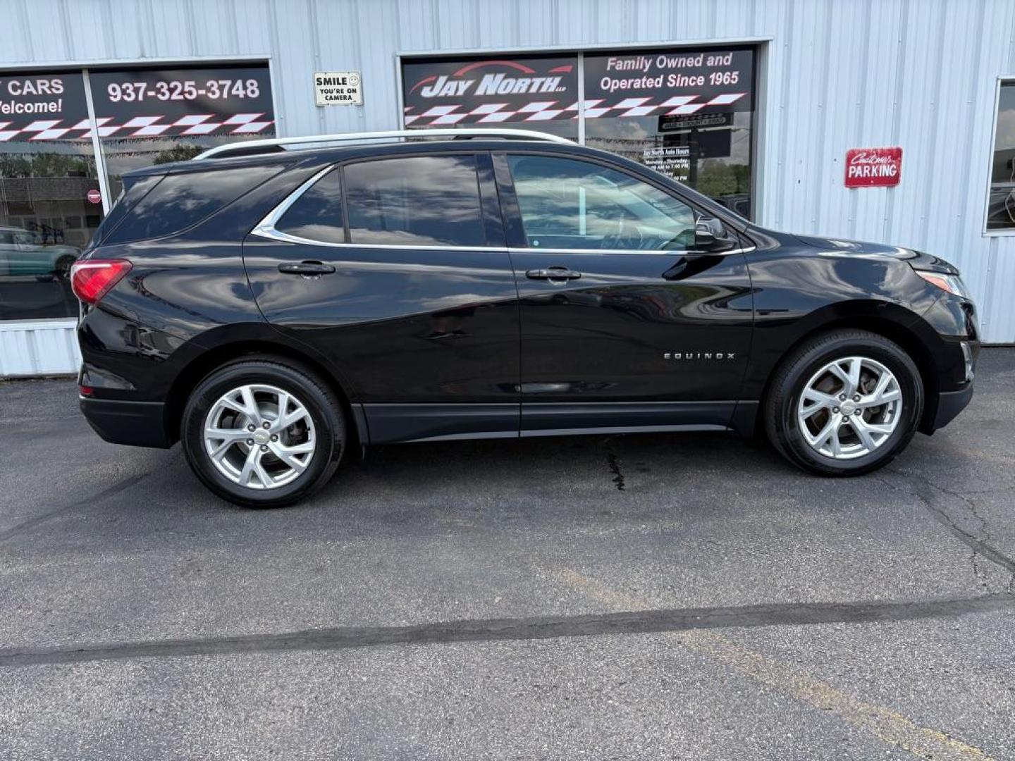 2018 BLACK CHEVROLET EQUINOX LT (2GNAXTEX0J6) with an 2.0L engine, Automatic transmission, located at 501 E. Columbia St., Springfield, OH, 45503, (800) 262-7122, 39.925262, -83.801796 - ***Clean Carfax***LT***Heated Seats***Power Liftgate***Remote Start***New Tires***All New Brake Pads and Rotors***New Spark Plugs***New Air Filter and Cabin Air Filter***New Wiper Blades***Fresh Oil Change*** Jay North Auto has offered hand picked vehicles since 1965! Our customer's enjoy a NO - Photo#1