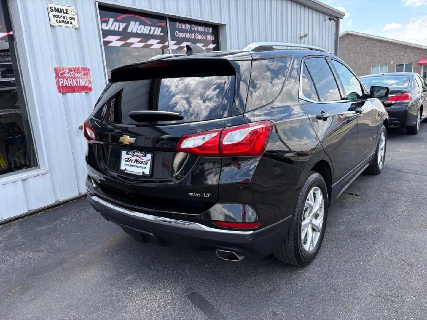 2018 BLACK CHEVROLET EQUINOX LT (2GNAXTEX0J6) with an 2.0L engine, Automatic transmission, located at 501 E. Columbia St., Springfield, OH, 45503, (800) 262-7122, 39.925262, -83.801796 - ***Clean Carfax***LT***Heated Seats***Power Liftgate***Remote Start***New Tires***All New Brake Pads and Rotors***New Spark Plugs***New Air Filter and Cabin Air Filter***New Wiper Blades***Fresh Oil Change*** Jay North Auto has offered hand picked vehicles since 1965! Our customer's enjoy a NO - Photo#2