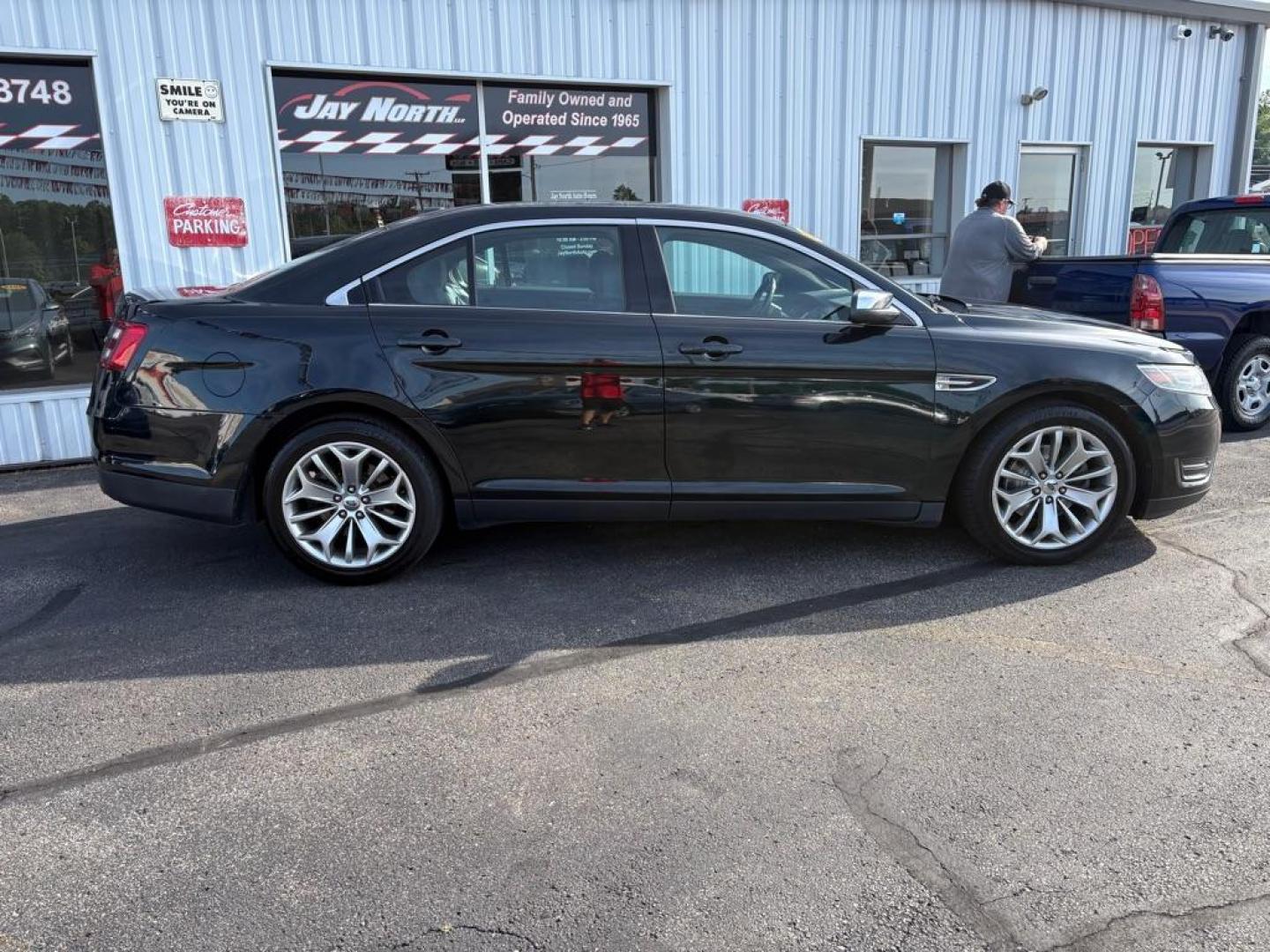 2014 BLACK FORD TAURUS LIMITED (1FAHP2F86EG) with an 3.5L engine, Automatic transmission, located at 501 E. Columbia St., Springfield, OH, 45503, (800) 262-7122, 39.925262, -83.801796 - *** New Front Brakes *** Oil Change *** New Wipers *** New Air and Cabin filter *** New Belt *** Inspection *** V6 *** Leather *** Back Up Camera *** Premium Audio w/ Touchscreen Navigation *** NICE *** FWD *** Alloy Wheels *** Jay North Auto has offered hand picked vehicles since 1965! Our cu - Photo#1