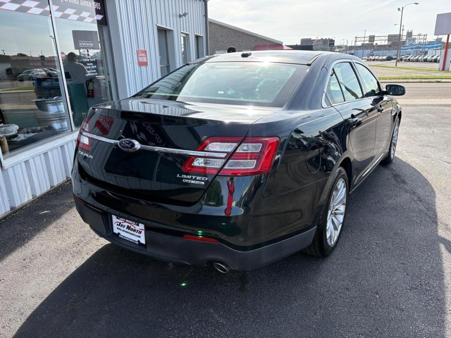 2014 BLACK FORD TAURUS LIMITED (1FAHP2F86EG) with an 3.5L engine, Automatic transmission, located at 501 E. Columbia St., Springfield, OH, 45503, (800) 262-7122, 39.925262, -83.801796 - *** New Front Brakes *** Oil Change *** New Wipers *** New Air and Cabin filter *** New Belt *** Inspection *** V6 *** Leather *** Back Up Camera *** Premium Audio w/ Touchscreen Navigation *** NICE *** FWD *** Alloy Wheels *** Jay North Auto has offered hand picked vehicles since 1965! Our cu - Photo#2