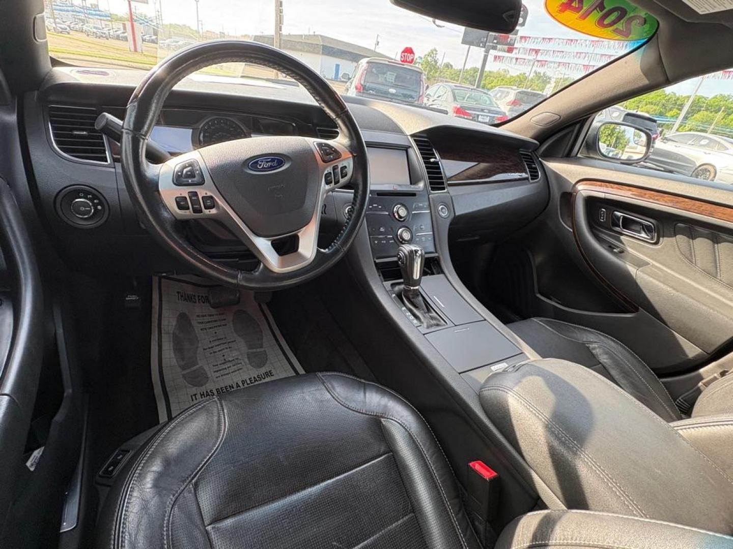 2014 BLACK FORD TAURUS LIMITED (1FAHP2F86EG) with an 3.5L engine, Automatic transmission, located at 501 E. Columbia St., Springfield, OH, 45503, (800) 262-7122, 39.925262, -83.801796 - *** New Front Brakes *** Oil Change *** New Wipers *** New Air and Cabin filter *** New Belt *** Inspection *** V6 *** Leather *** Back Up Camera *** Premium Audio w/ Touchscreen Navigation *** NICE *** FWD *** Alloy Wheels *** Jay North Auto has offered hand picked vehicles since 1965! Our cu - Photo#9