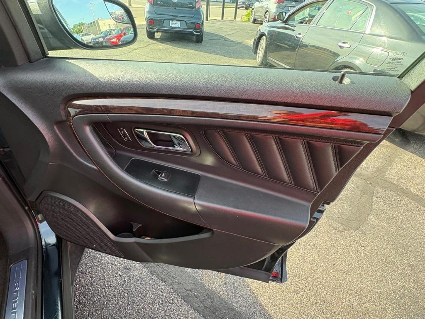 2014 BLACK FORD TAURUS LIMITED (1FAHP2F86EG) with an 3.5L engine, Automatic transmission, located at 501 E. Columbia St., Springfield, OH, 45503, (800) 262-7122, 39.925262, -83.801796 - *** New Front Brakes *** Oil Change *** New Wipers *** New Air and Cabin filter *** New Belt *** Inspection *** V6 *** Leather *** Back Up Camera *** Premium Audio w/ Touchscreen Navigation *** NICE *** FWD *** Alloy Wheels *** Jay North Auto has offered hand picked vehicles since 1965! Our cu - Photo#15