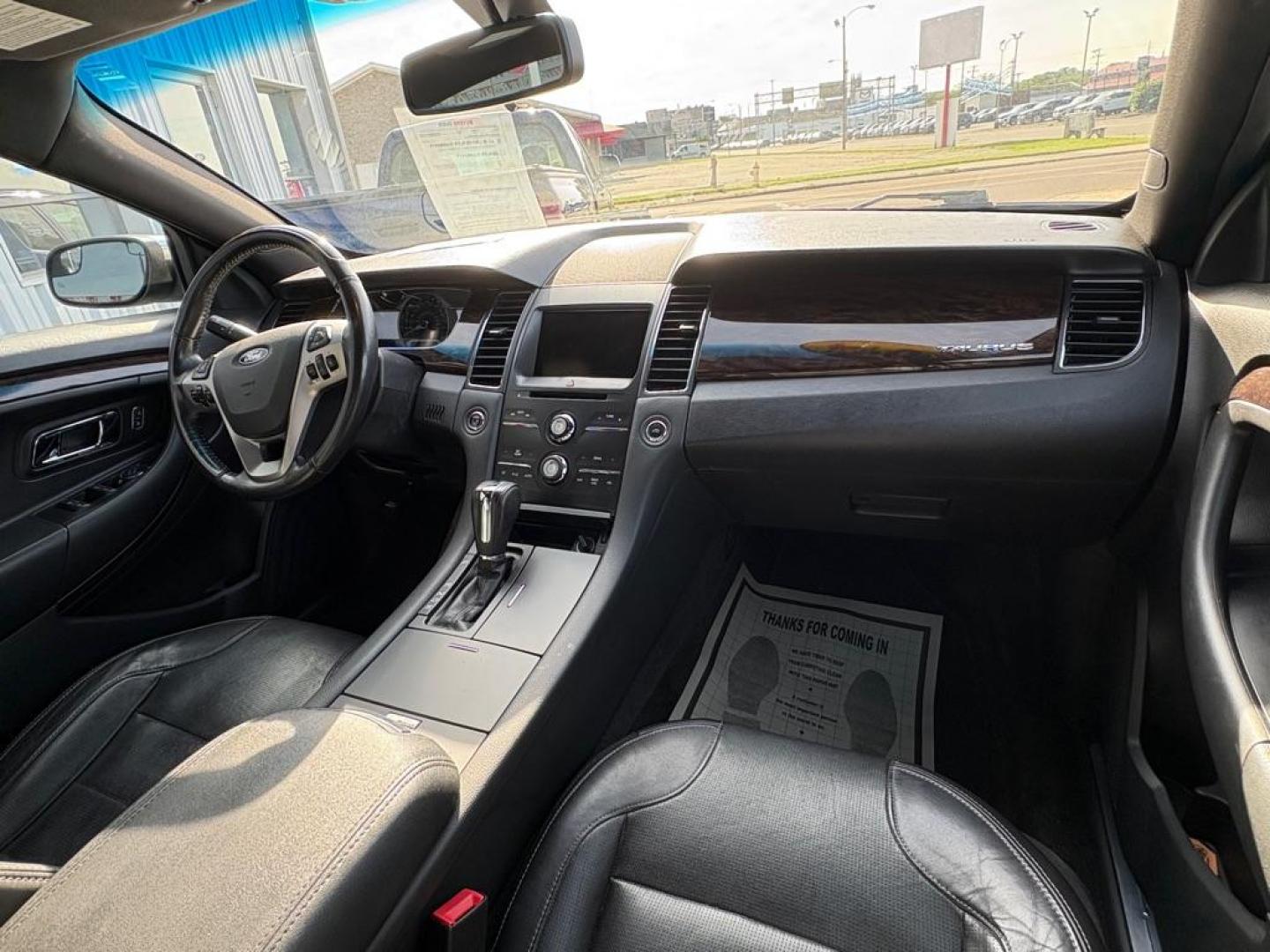 2014 BLACK FORD TAURUS LIMITED (1FAHP2F86EG) with an 3.5L engine, Automatic transmission, located at 501 E. Columbia St., Springfield, OH, 45503, (800) 262-7122, 39.925262, -83.801796 - *** New Front Brakes *** Oil Change *** New Wipers *** New Air and Cabin filter *** New Belt *** Inspection *** V6 *** Leather *** Back Up Camera *** Premium Audio w/ Touchscreen Navigation *** NICE *** FWD *** Alloy Wheels *** Jay North Auto has offered hand picked vehicles since 1965! Our cu - Photo#17