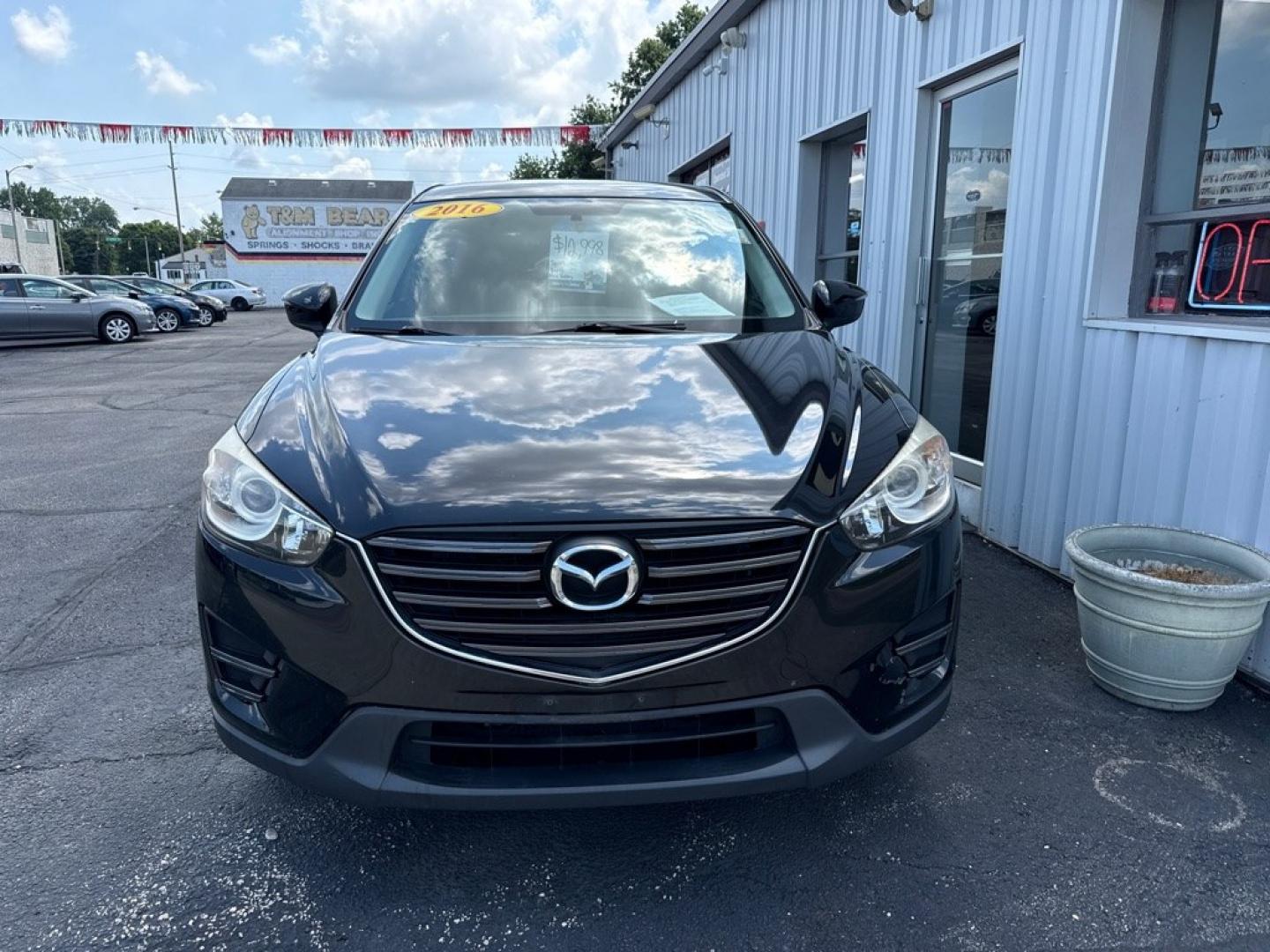 2016 BLACK MAZDA CX-5 SPORT (JM3KE2BY8G0) with an 2.5L engine, Automatic transmission, located at 501 E. Columbia St., Springfield, OH, 45503, (800) 262-7122, 39.925262, -83.801796 - *** 1 Owner *** 29 Records on CarFax *** Back Up Camera *** New Battery *** Inspection *** Oil Change *** Sport *** FWD *** Jay North Auto has offered hand picked vehicles since 1965! Our customer's enjoy a NO pressure buying experience with a small town feel. We are a preferred dealer for many- Photo#1