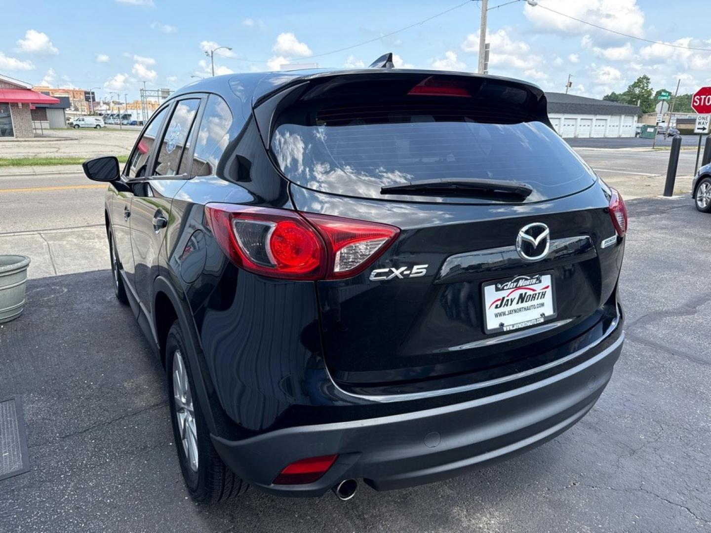2016 BLACK MAZDA CX-5 SPORT (JM3KE2BY8G0) with an 2.5L engine, Automatic transmission, located at 501 E. Columbia St., Springfield, OH, 45503, (800) 262-7122, 39.925262, -83.801796 - *** 1 Owner *** 29 Records on CarFax *** Back Up Camera *** New Battery *** Inspection *** Oil Change *** Sport *** FWD *** Jay North Auto has offered hand picked vehicles since 1965! Our customer's enjoy a NO pressure buying experience with a small town feel. We are a preferred dealer for many- Photo#4