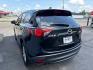 2016 BLACK MAZDA CX-5 SPORT (JM3KE2BY8G0) with an 2.5L engine, Automatic transmission, located at 501 E. Columbia St., Springfield, OH, 45503, (800) 262-7122, 39.925262, -83.801796 - *** 1 Owner *** 29 Records on CarFax *** Back Up Camera *** New Battery *** Inspection *** Oil Change *** Sport *** FWD *** Jay North Auto has offered hand picked vehicles since 1965! Our customer's enjoy a NO pressure buying experience with a small town feel. We are a preferred dealer for many- Photo#4
