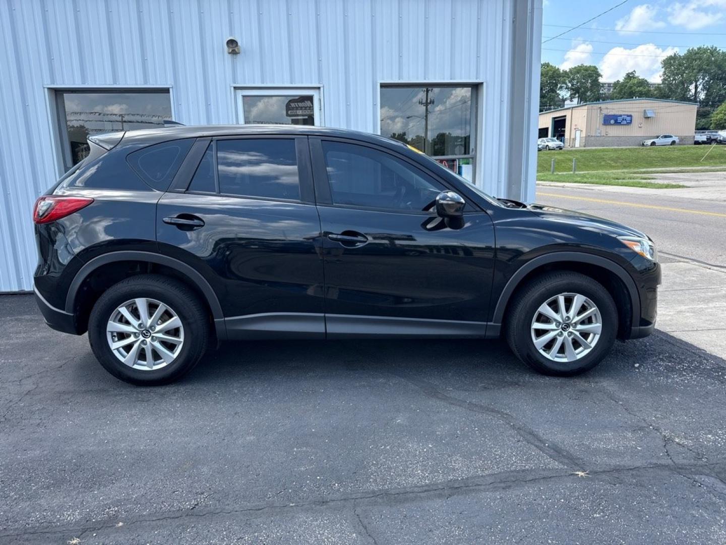 2016 BLACK MAZDA CX-5 SPORT (JM3KE2BY8G0) with an 2.5L engine, Automatic transmission, located at 501 E. Columbia St., Springfield, OH, 45503, (800) 262-7122, 39.925262, -83.801796 - *** 1 Owner *** 29 Records on CarFax *** Back Up Camera *** New Battery *** Inspection *** Oil Change *** Sport *** FWD *** Jay North Auto has offered hand picked vehicles since 1965! Our customer's enjoy a NO pressure buying experience with a small town feel. We are a preferred dealer for many- Photo#7
