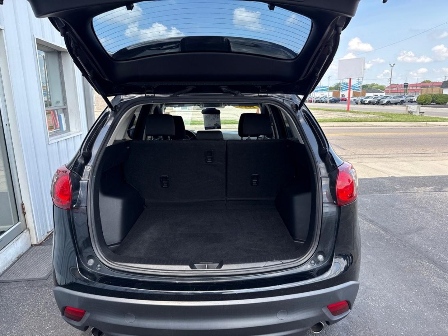 2016 BLACK MAZDA CX-5 SPORT (JM3KE2BY8G0) with an 2.5L engine, Automatic transmission, located at 501 E. Columbia St., Springfield, OH, 45503, (800) 262-7122, 39.925262, -83.801796 - *** 1 Owner *** 29 Records on CarFax *** Back Up Camera *** New Battery *** Inspection *** Oil Change *** Sport *** FWD *** Jay North Auto has offered hand picked vehicles since 1965! Our customer's enjoy a NO pressure buying experience with a small town feel. We are a preferred dealer for many- Photo#8