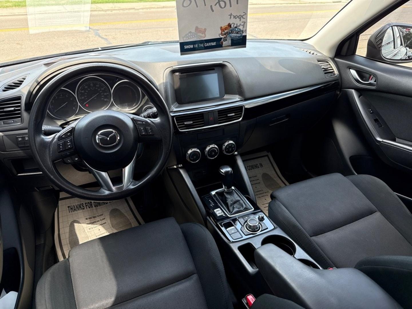 2016 BLACK MAZDA CX-5 SPORT (JM3KE2BY8G0) with an 2.5L engine, Automatic transmission, located at 501 E. Columbia St., Springfield, OH, 45503, (800) 262-7122, 39.925262, -83.801796 - *** 1 Owner *** 29 Records on CarFax *** Back Up Camera *** New Battery *** Inspection *** Oil Change *** Sport *** FWD *** Jay North Auto has offered hand picked vehicles since 1965! Our customer's enjoy a NO pressure buying experience with a small town feel. We are a preferred dealer for many- Photo#10